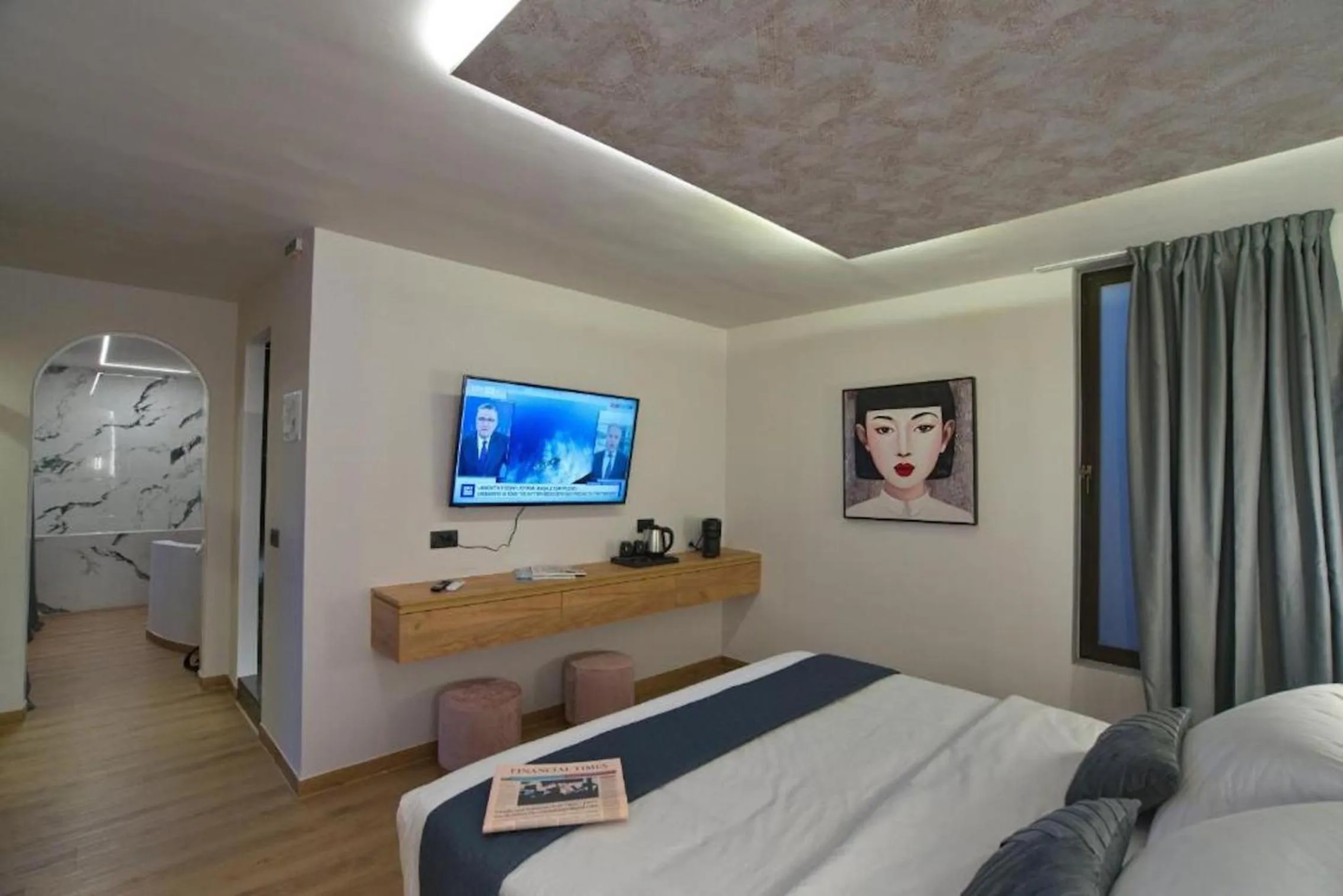 Bed in CITYLUXE Suites & Rooms