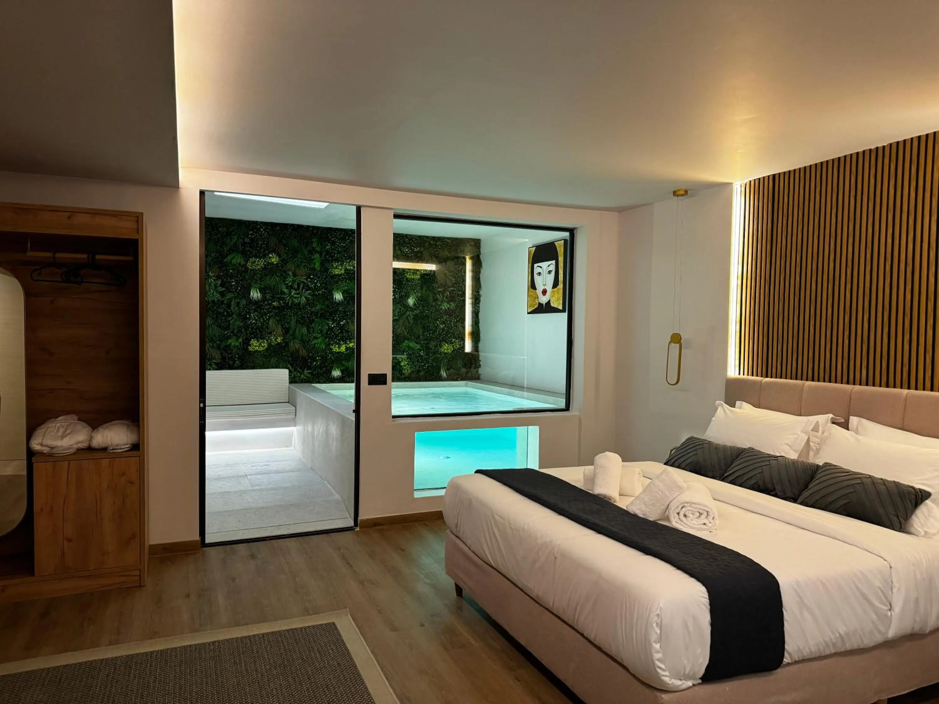 Swimming pool, Bed in CITYLUXE Suites & Rooms