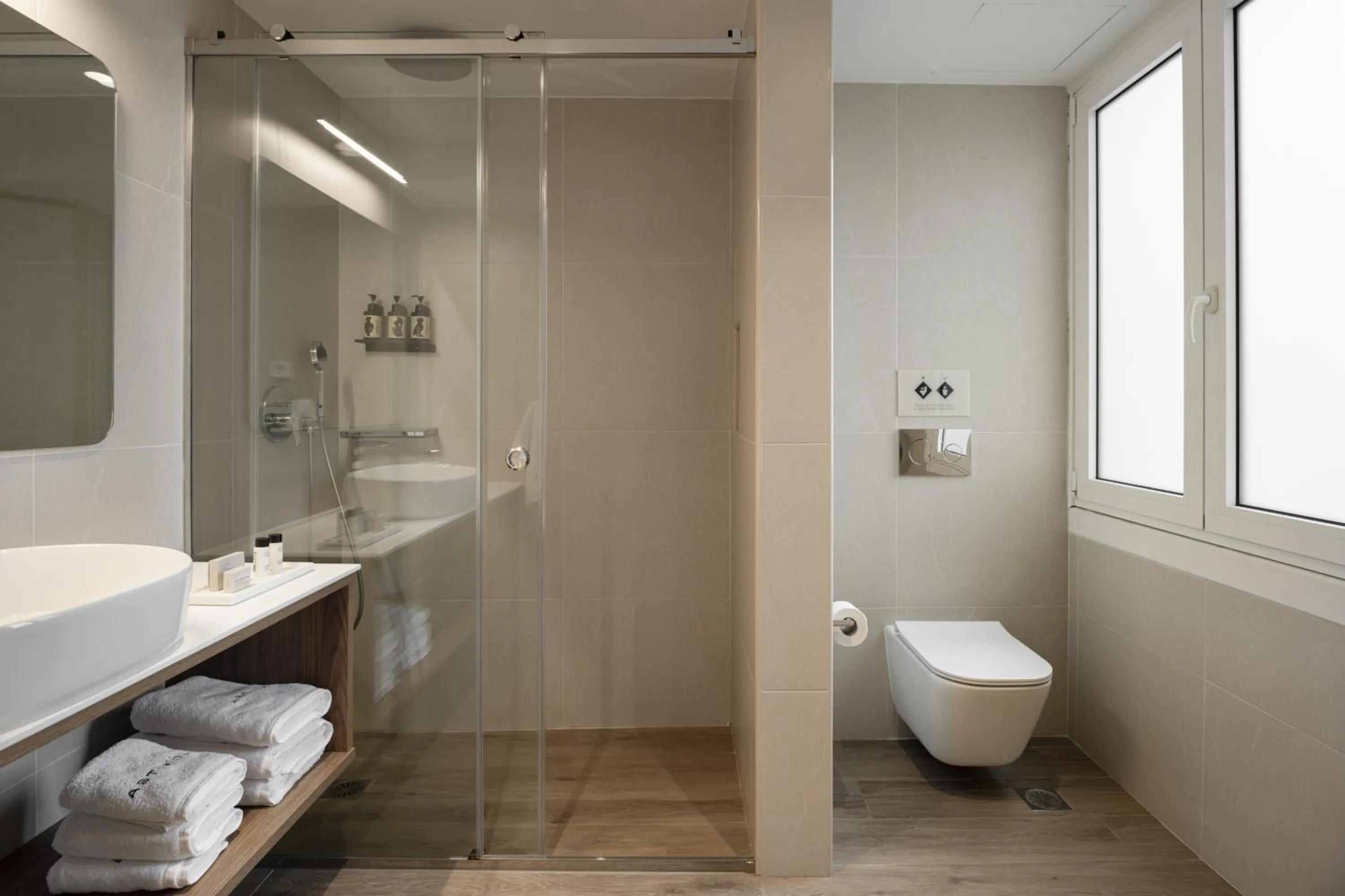 Shower in ASTIKON Xenofontos Suites