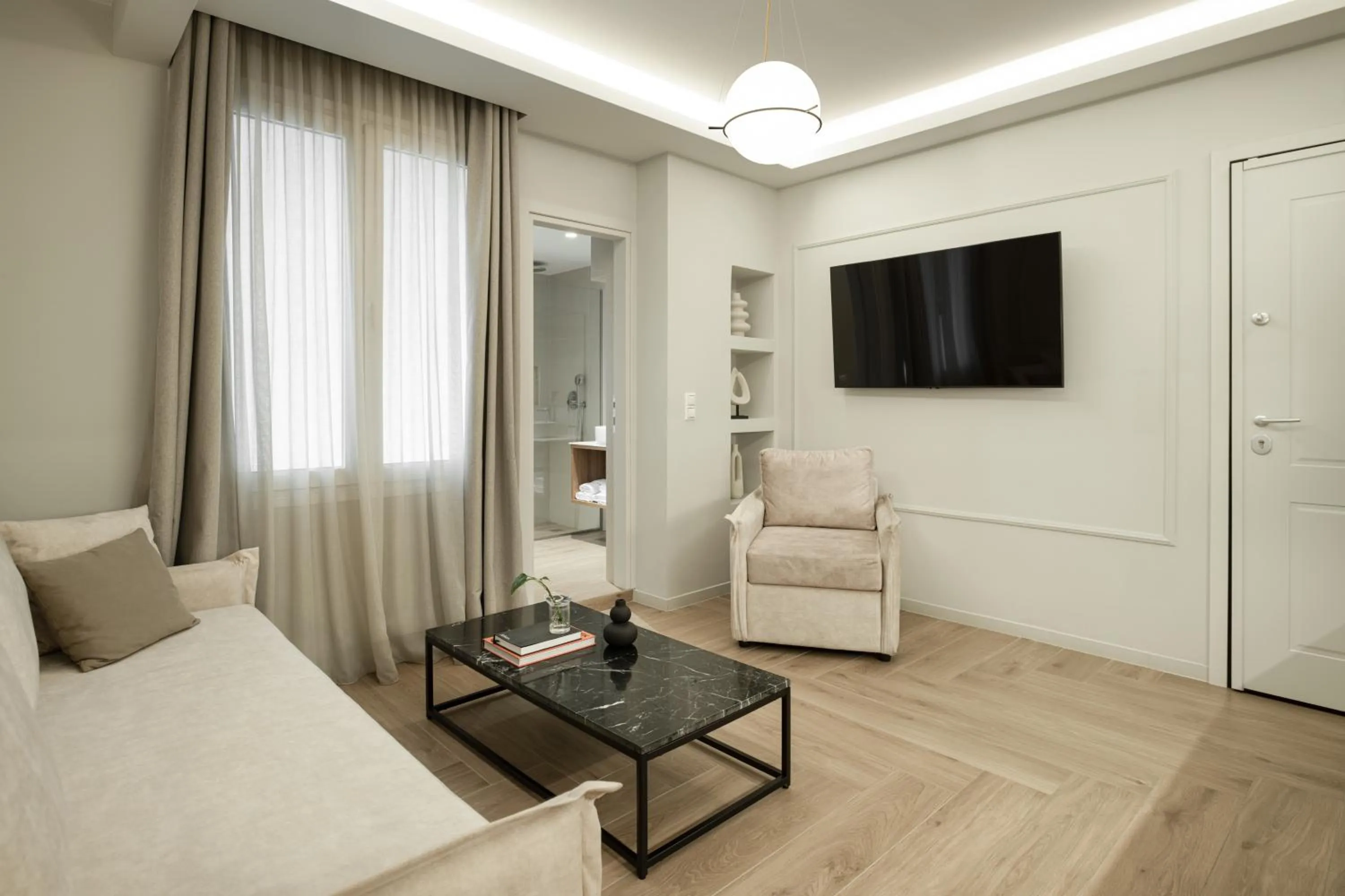 Living room in ASTIKON Xenofontos Suites