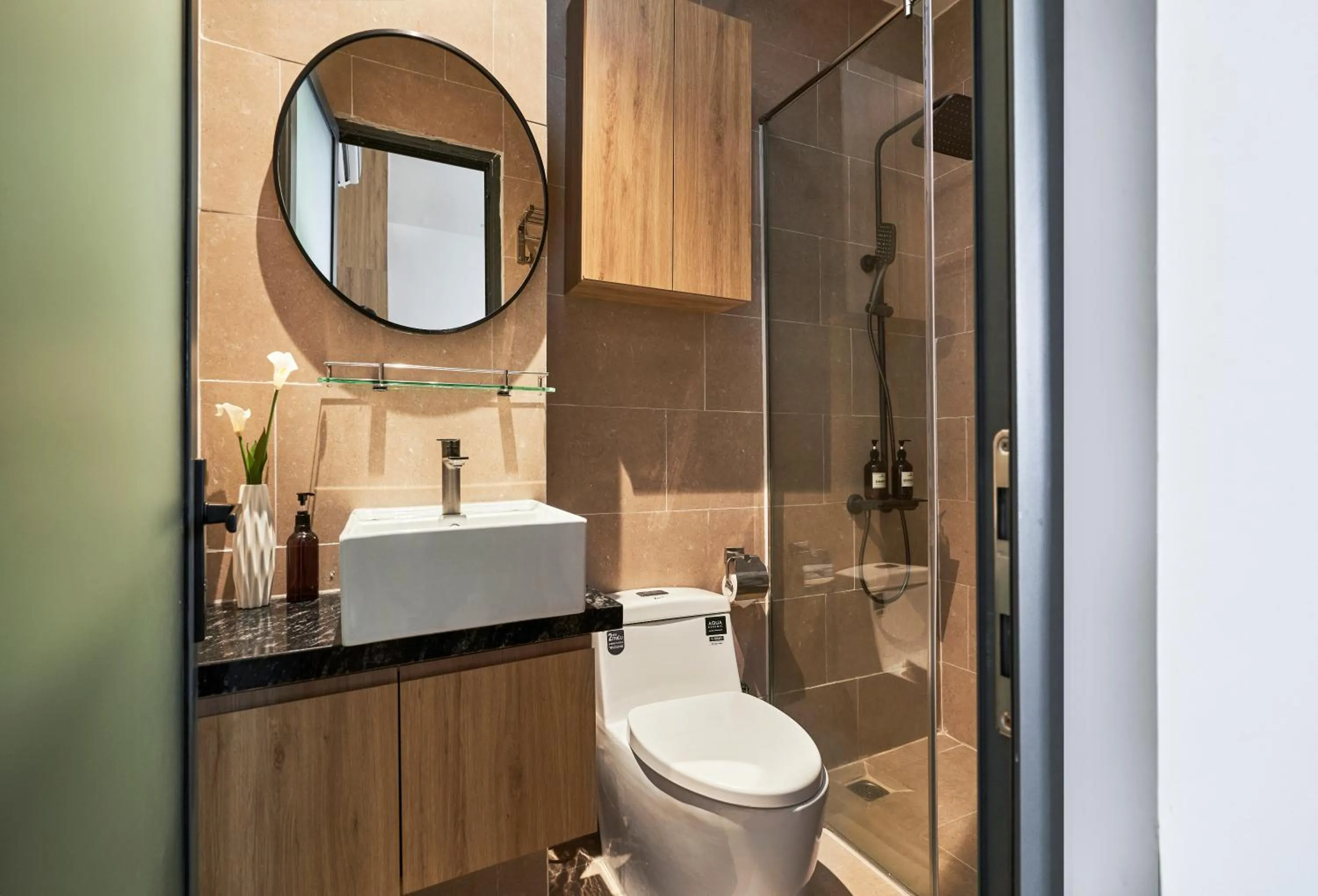 Shower in MIHN SUITES BEN THANH