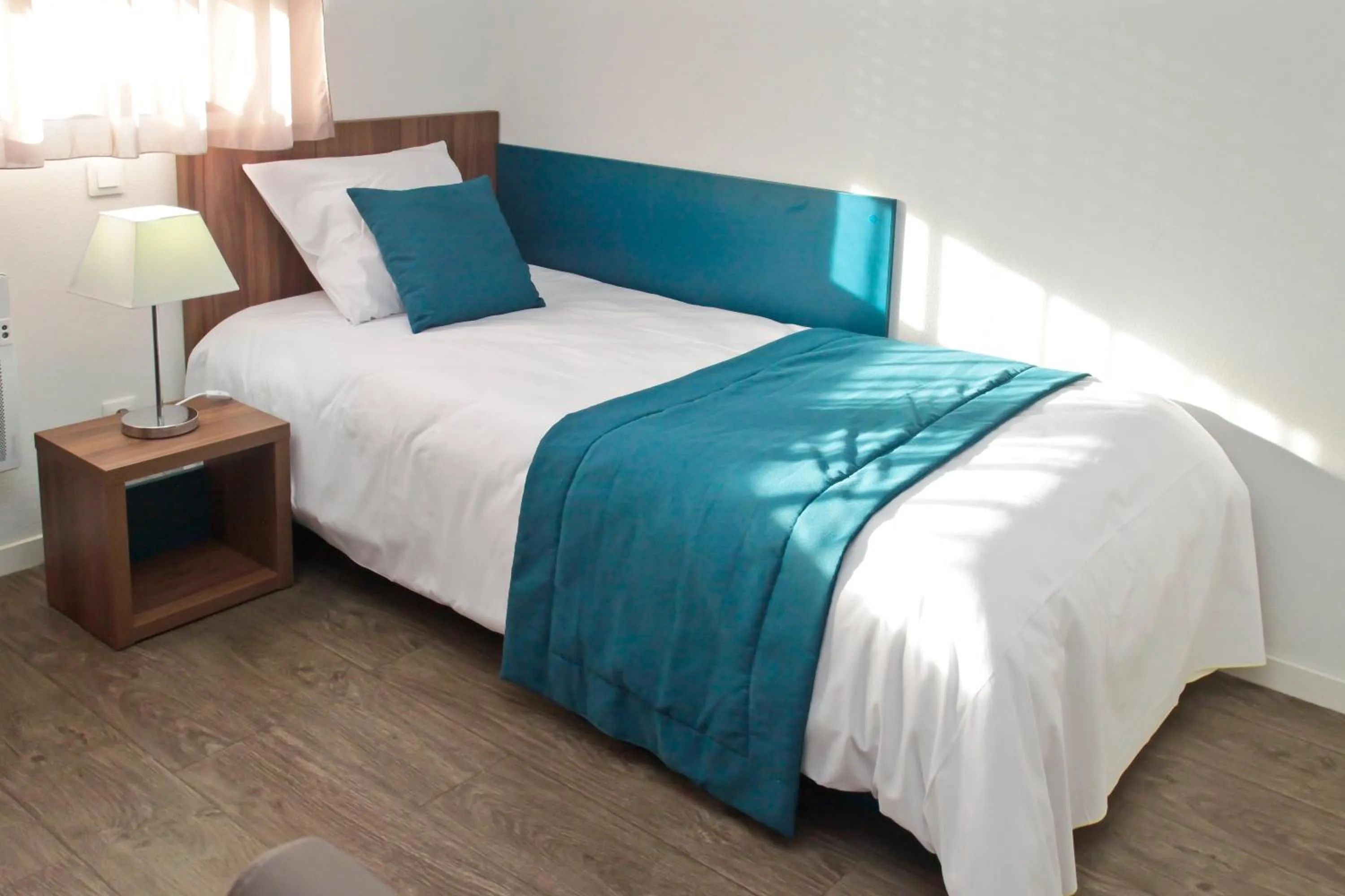 Living room, Bed in Appart Hotel Odalys City Tours Le Jardin des Lettres