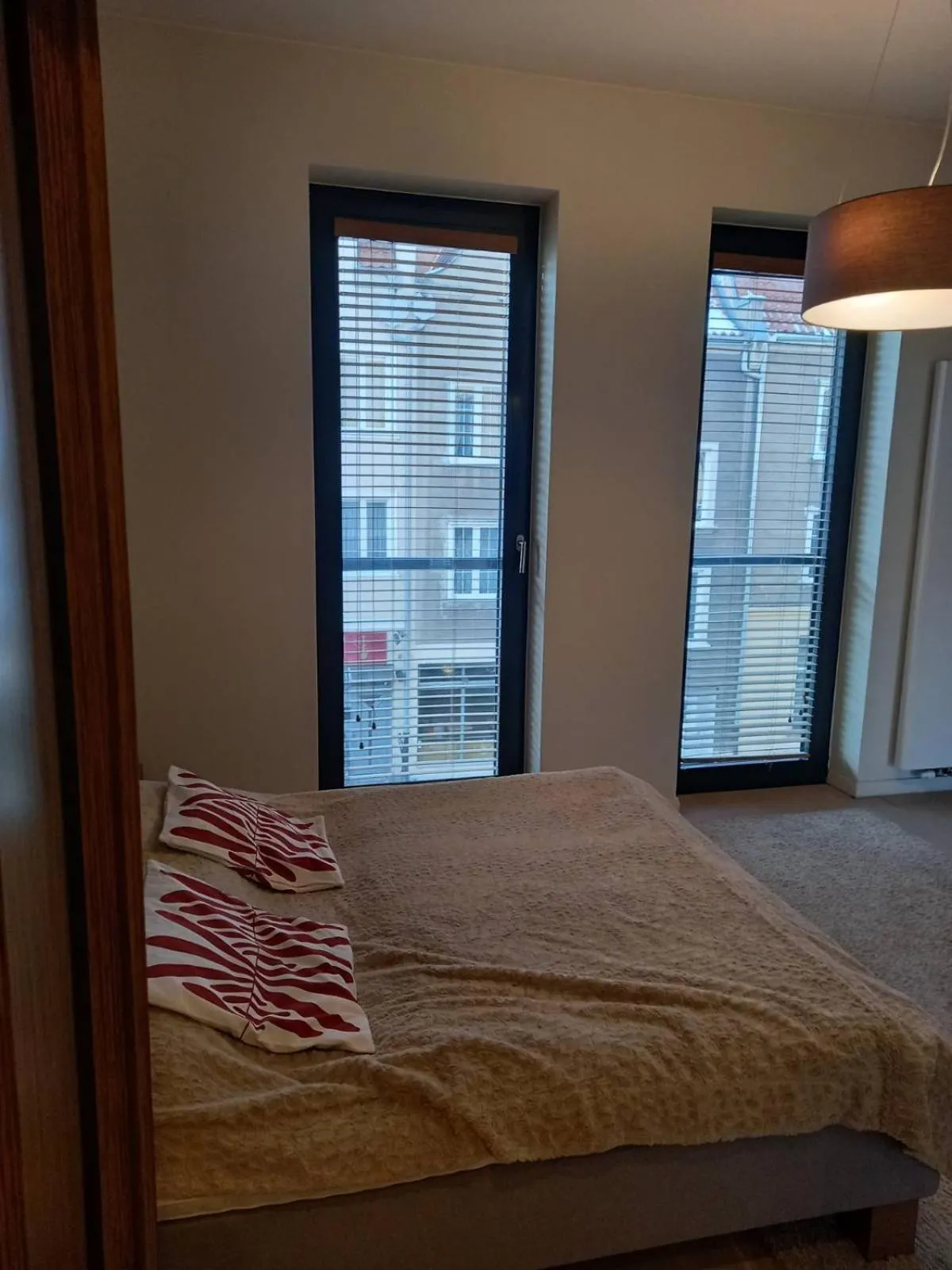 Bed in Apartment with an Amazing View