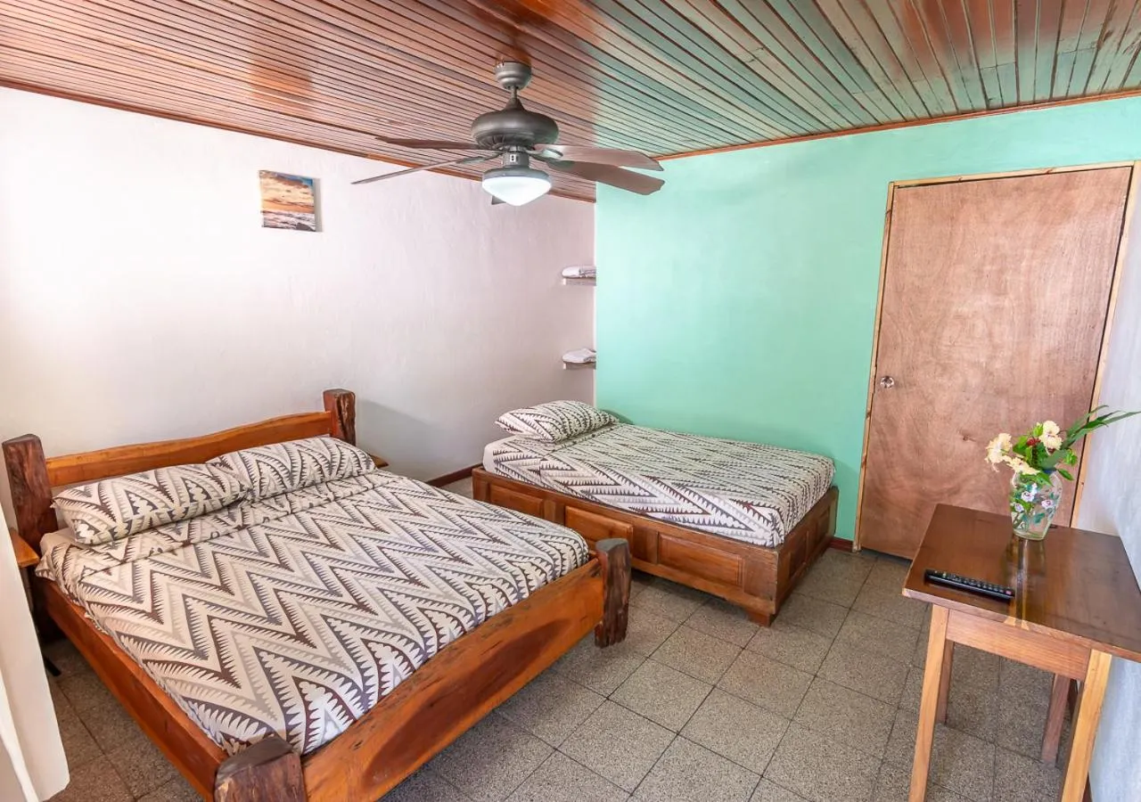 Photo of the whole room, Bed in Cabinas Arrecife