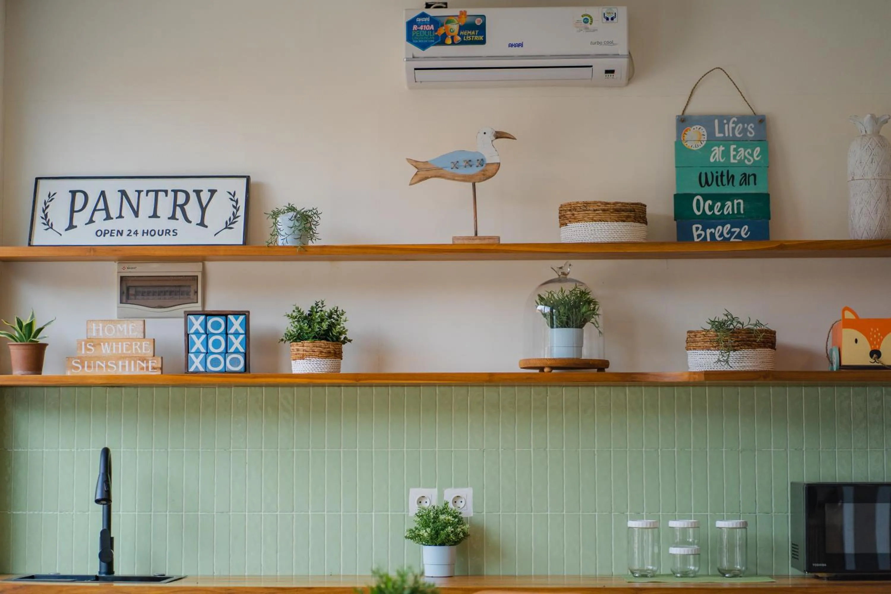 Communal kitchen in Alba Inn Sanur by SooBali