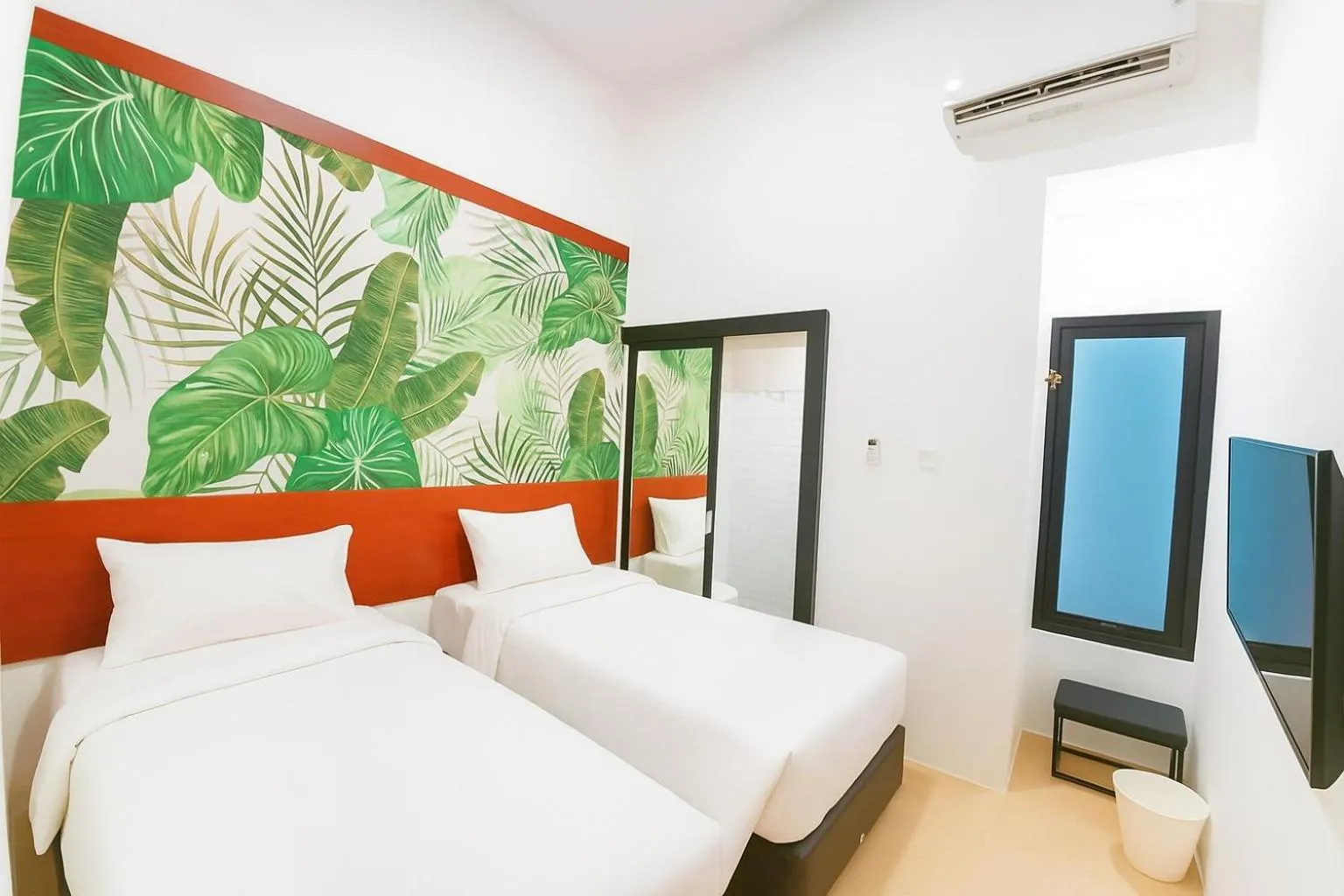 Bed in Nunia Tamansari Hotel