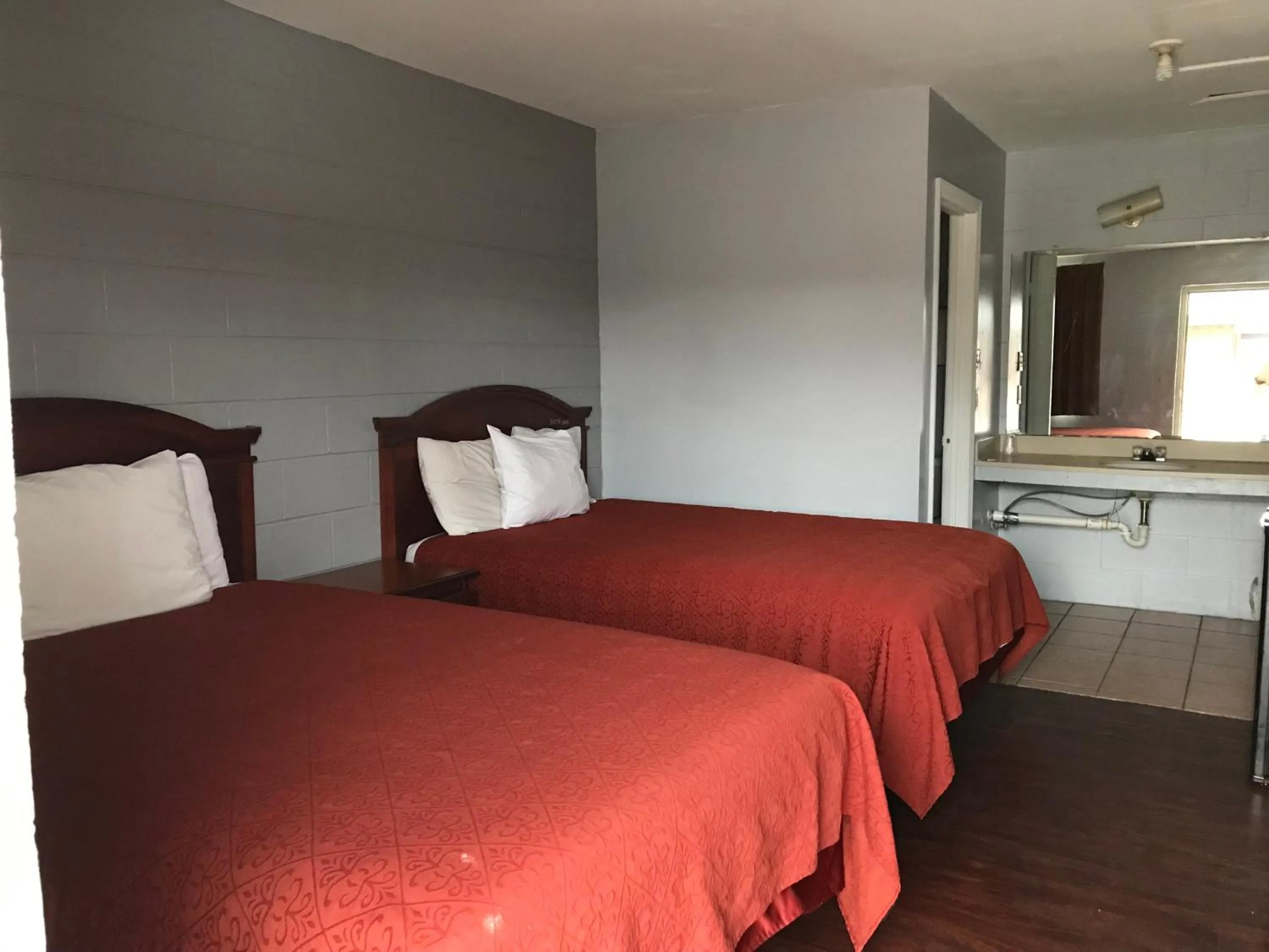 Bed in Sky Inn Hotel