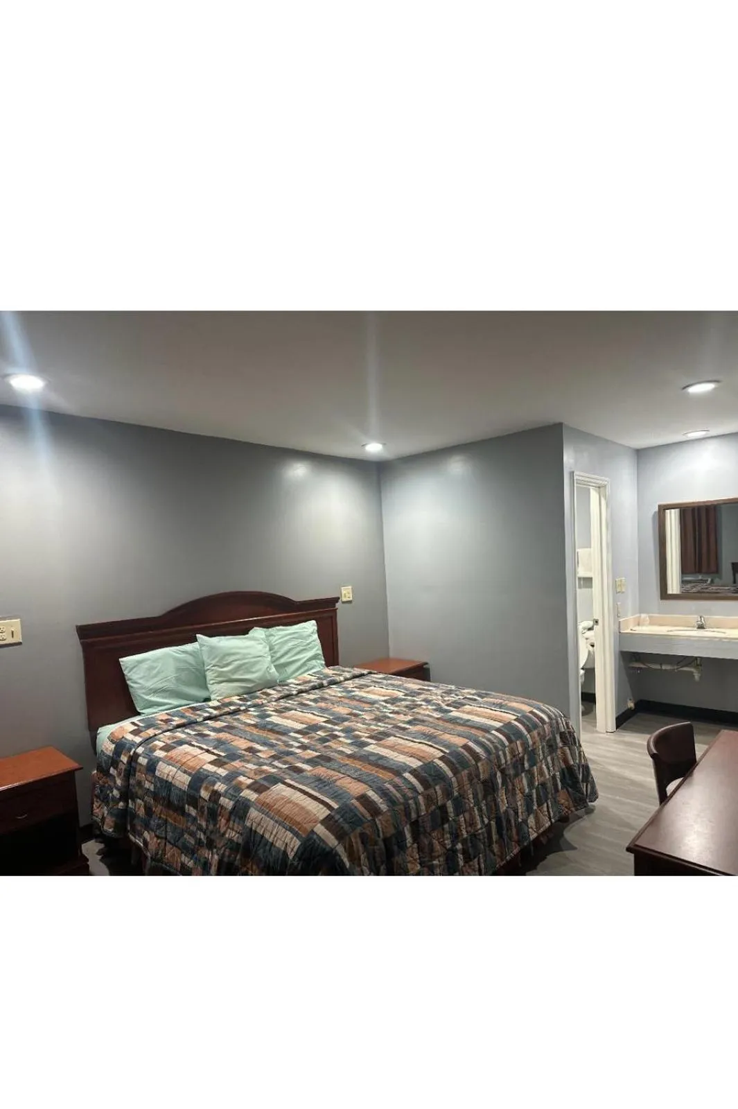 Bed in Sky Inn Hotel