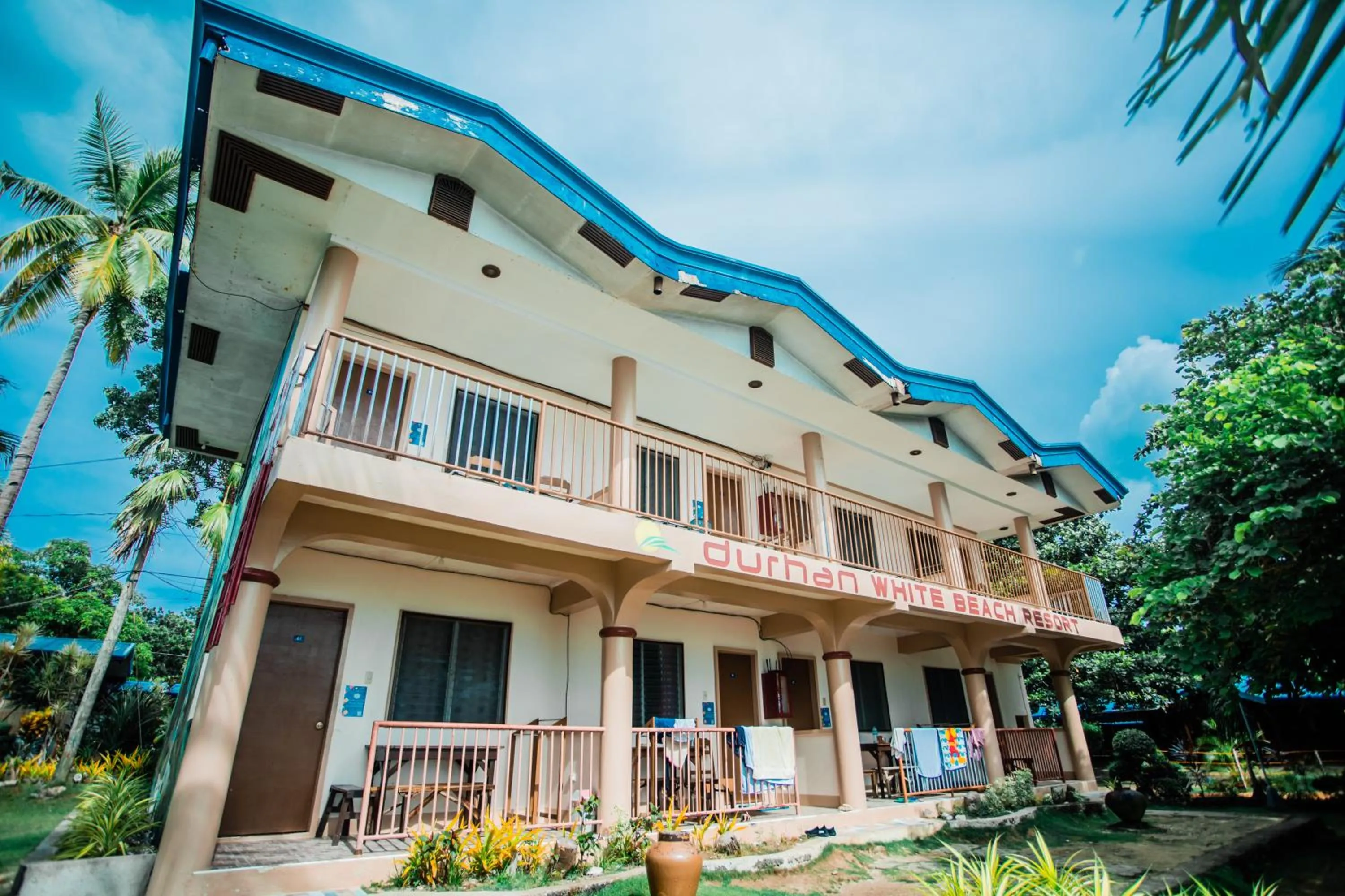 Property building in Durhan White Beach Resort powered by Cocotel