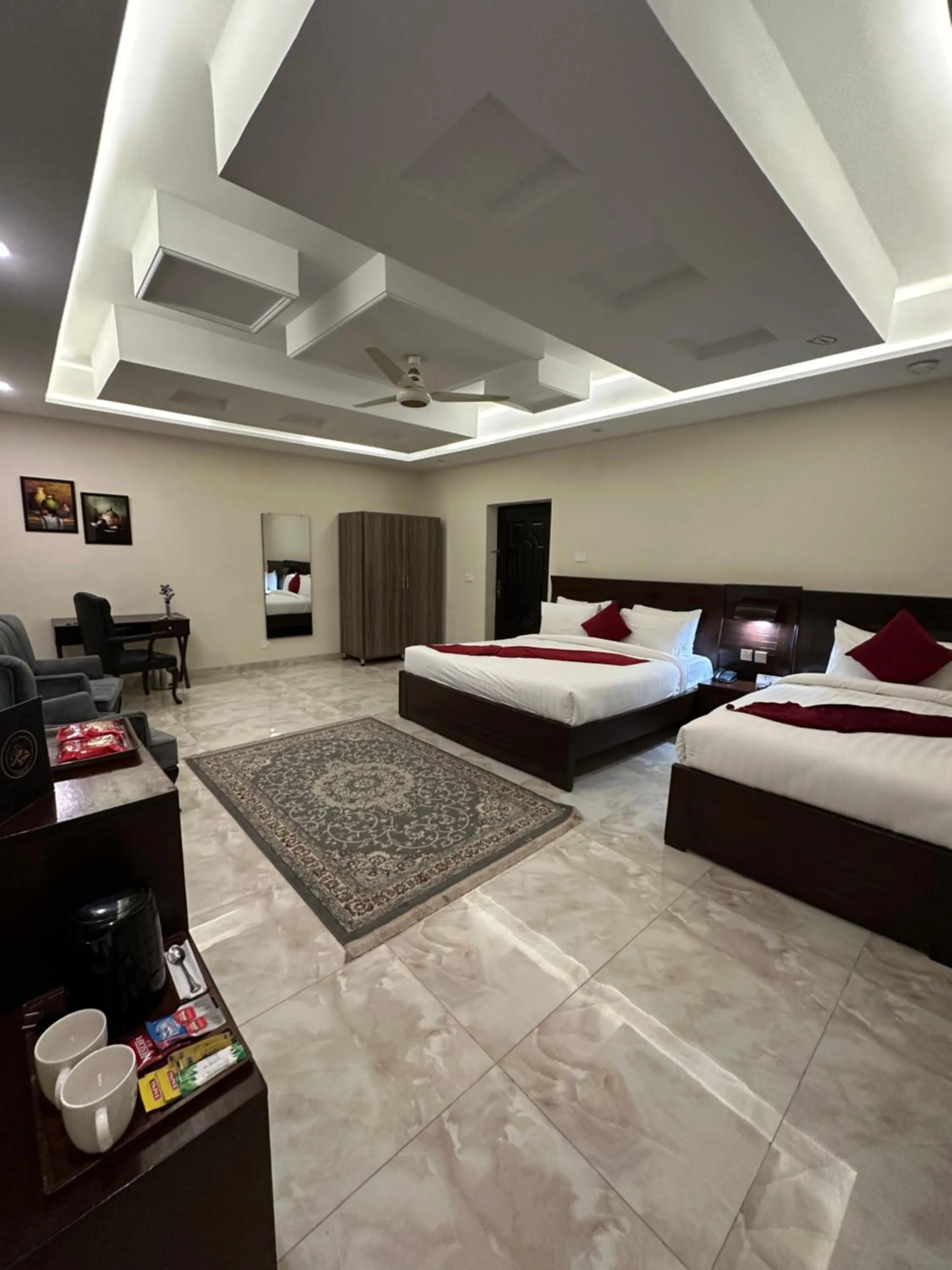 Photo of the whole room, Bed in Burj Ul Zaki
