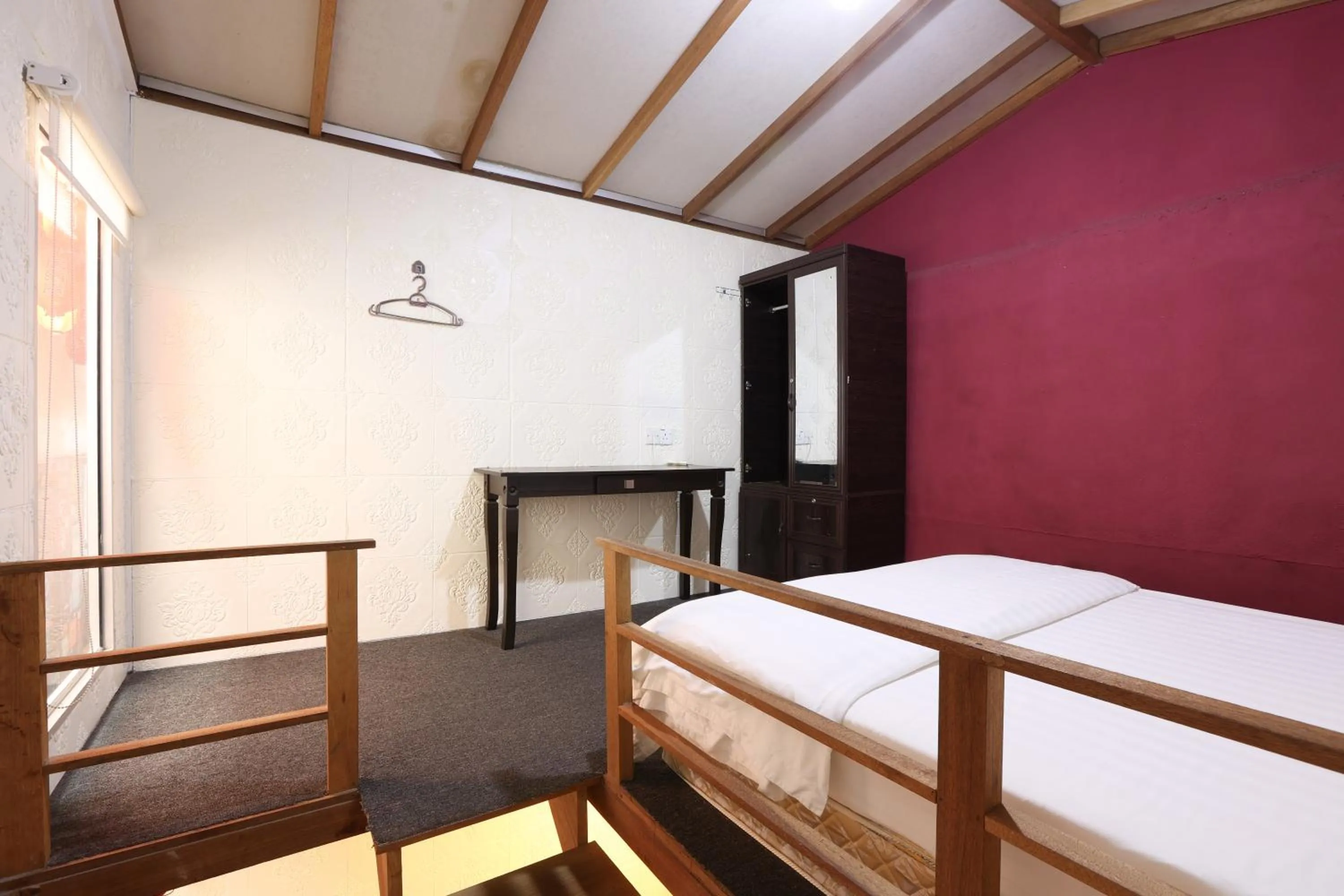 Bed in Dou Houz Georgetown