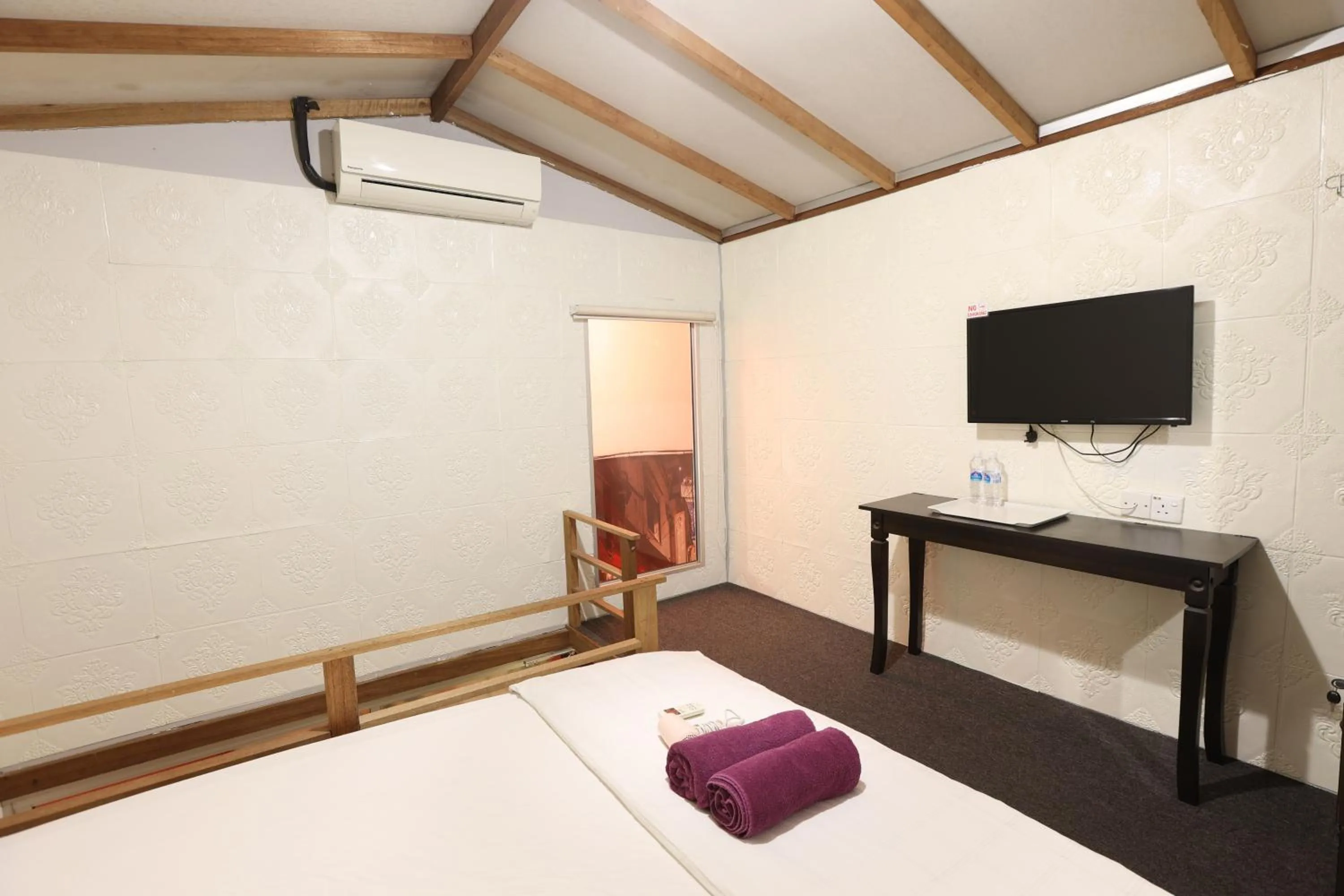 Bed in Dou Houz Georgetown