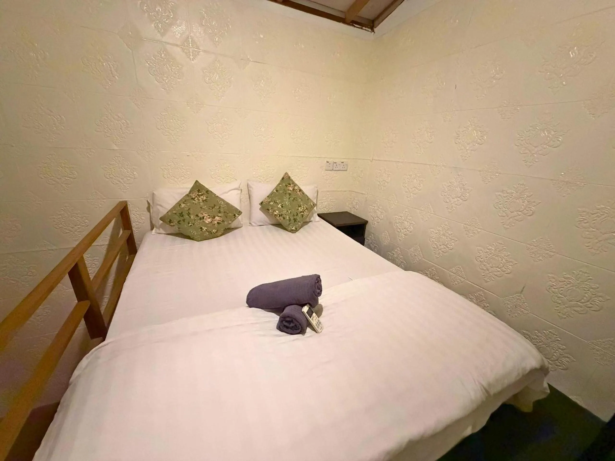 Bed in Dou Houz Georgetown