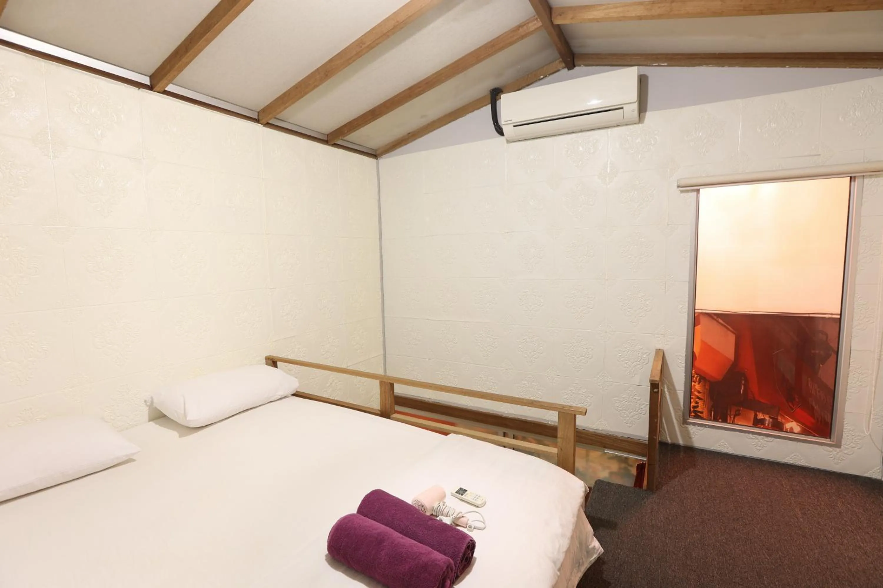 Bed in Dou Houz Georgetown