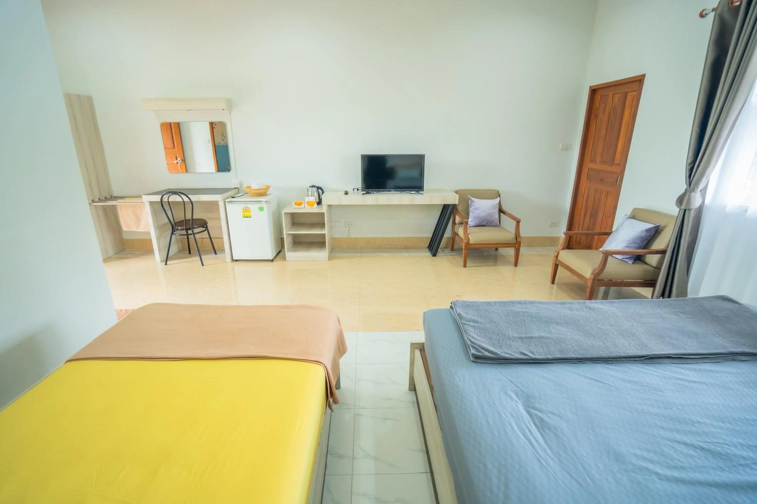 Living room, Bed in Ban Suan Bang Toei Homestay