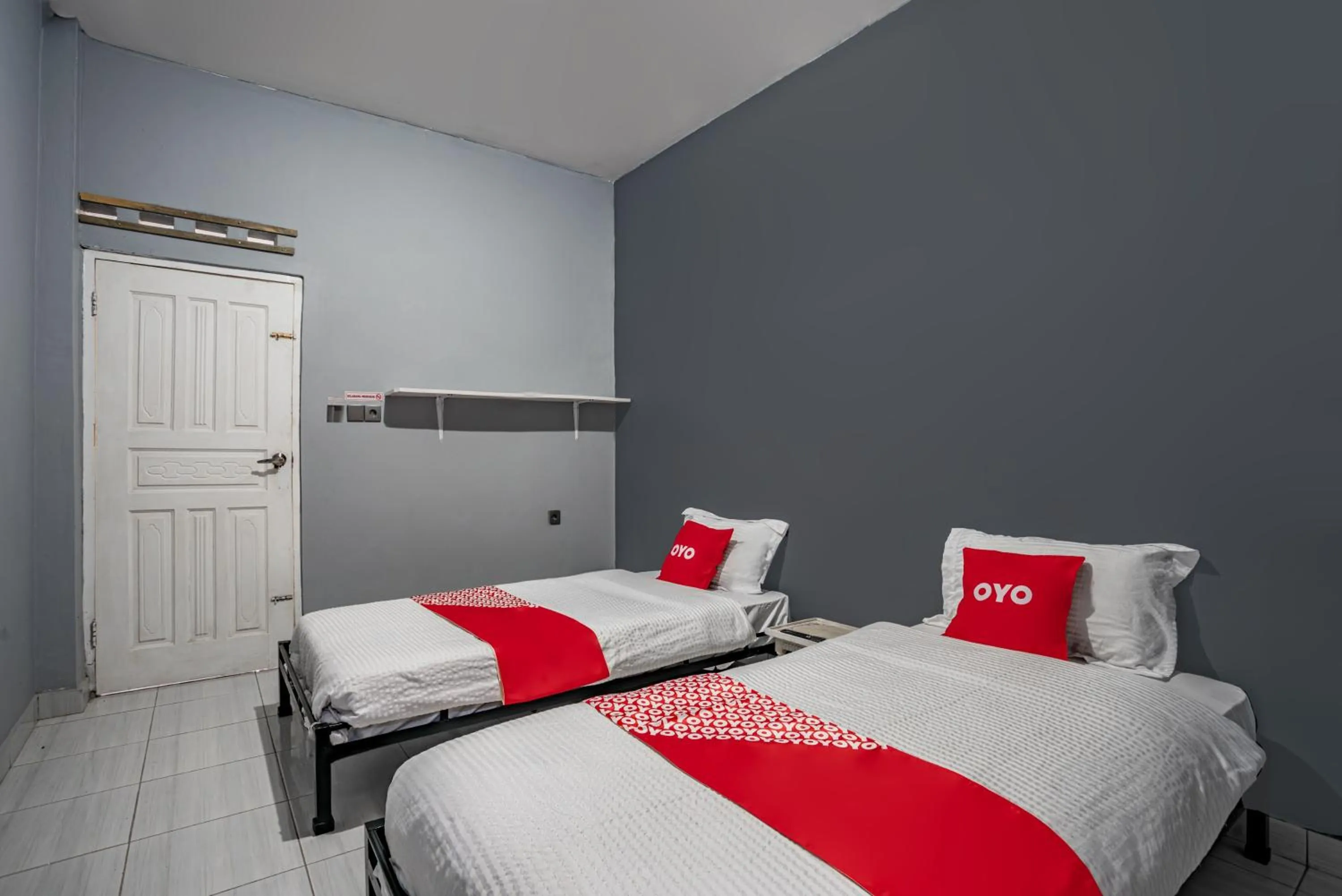 Bedroom in SUPER OYO Gandaria Guest House Near Masjid Raya Sumatera Barat