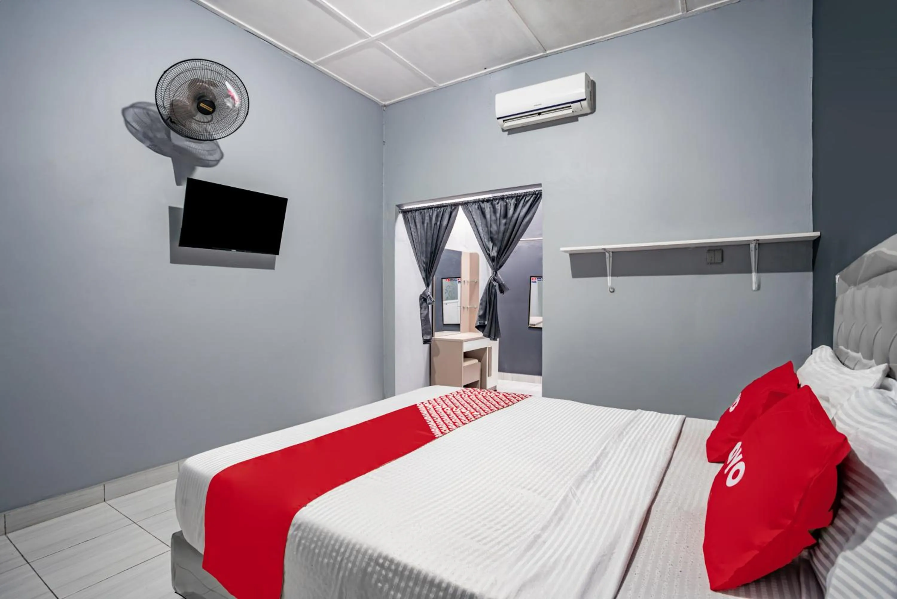 Bedroom in SUPER OYO Gandaria Guest House Near Masjid Raya Sumatera Barat