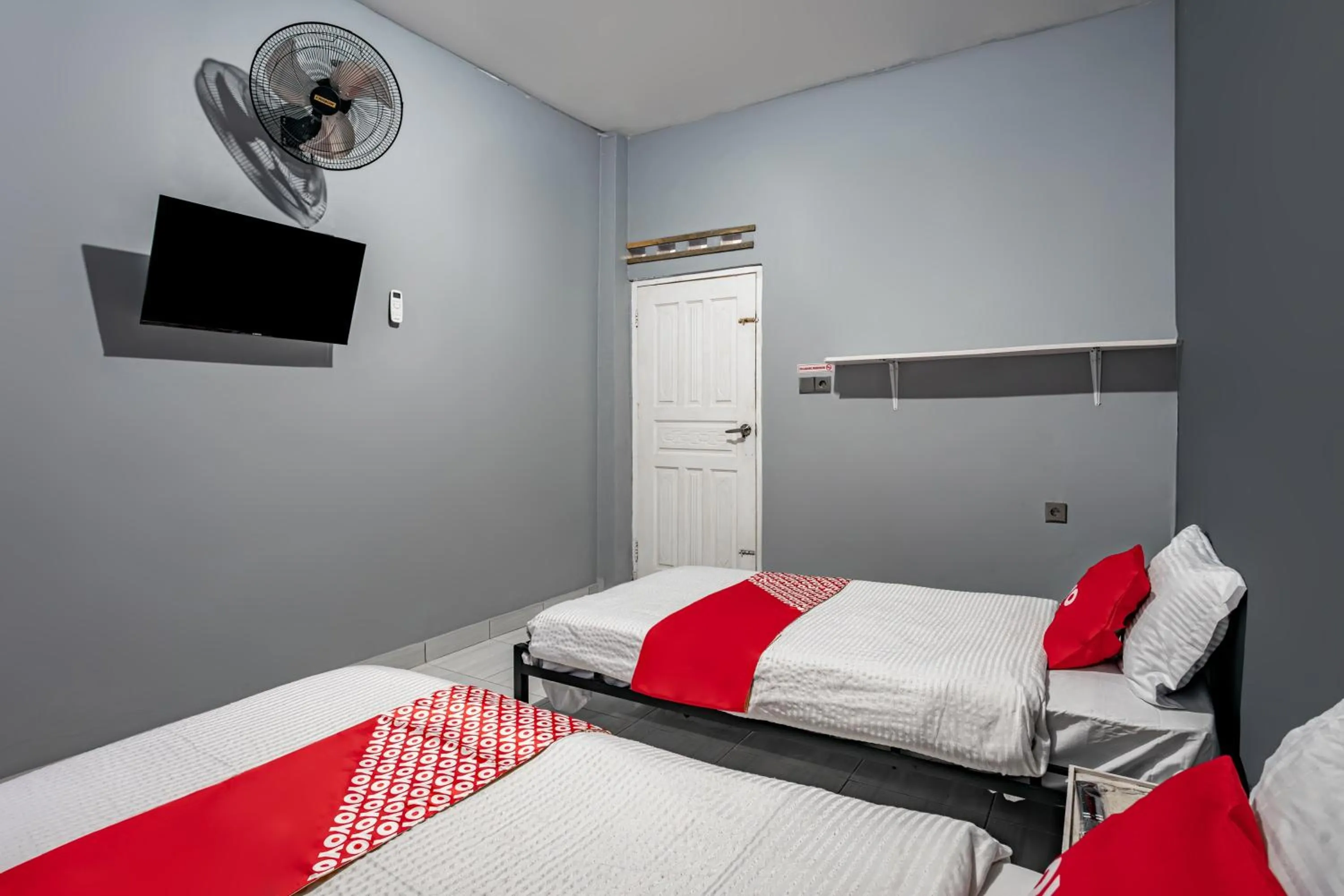 Bedroom in SUPER OYO Gandaria Guest House Near Masjid Raya Sumatera Barat