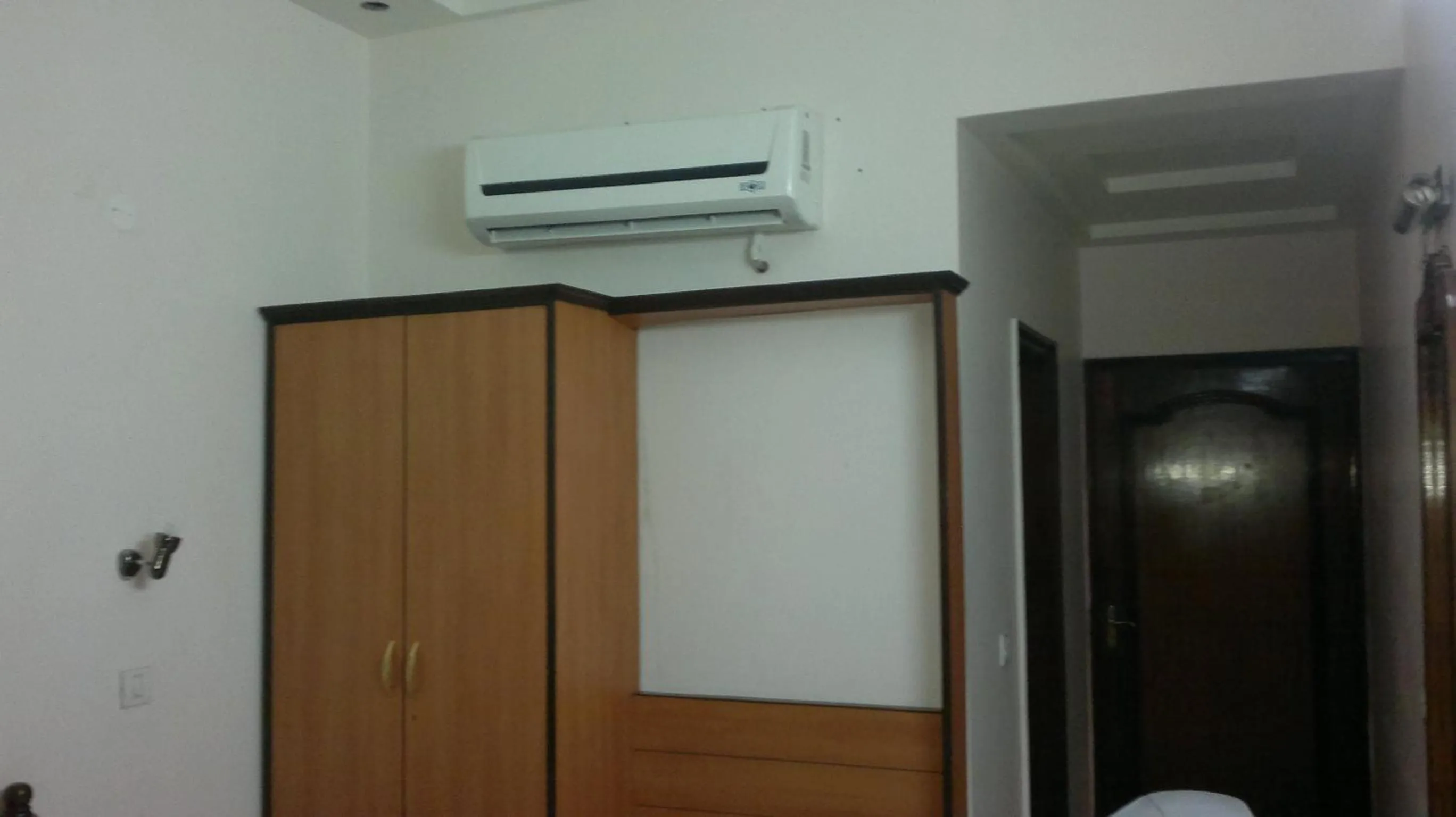 Bedroom in Hotel D R International