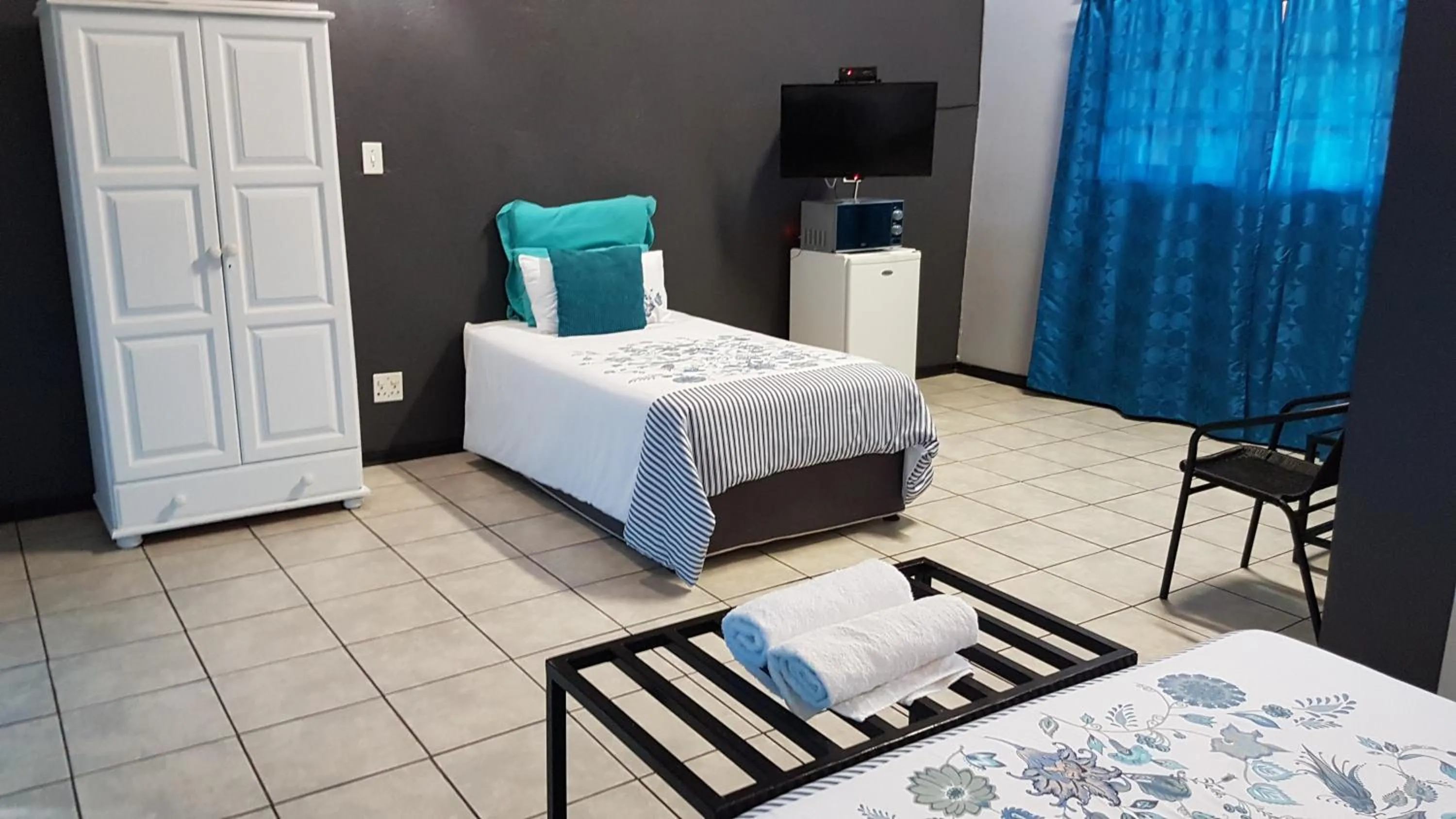 Bed in Siesta Guest House