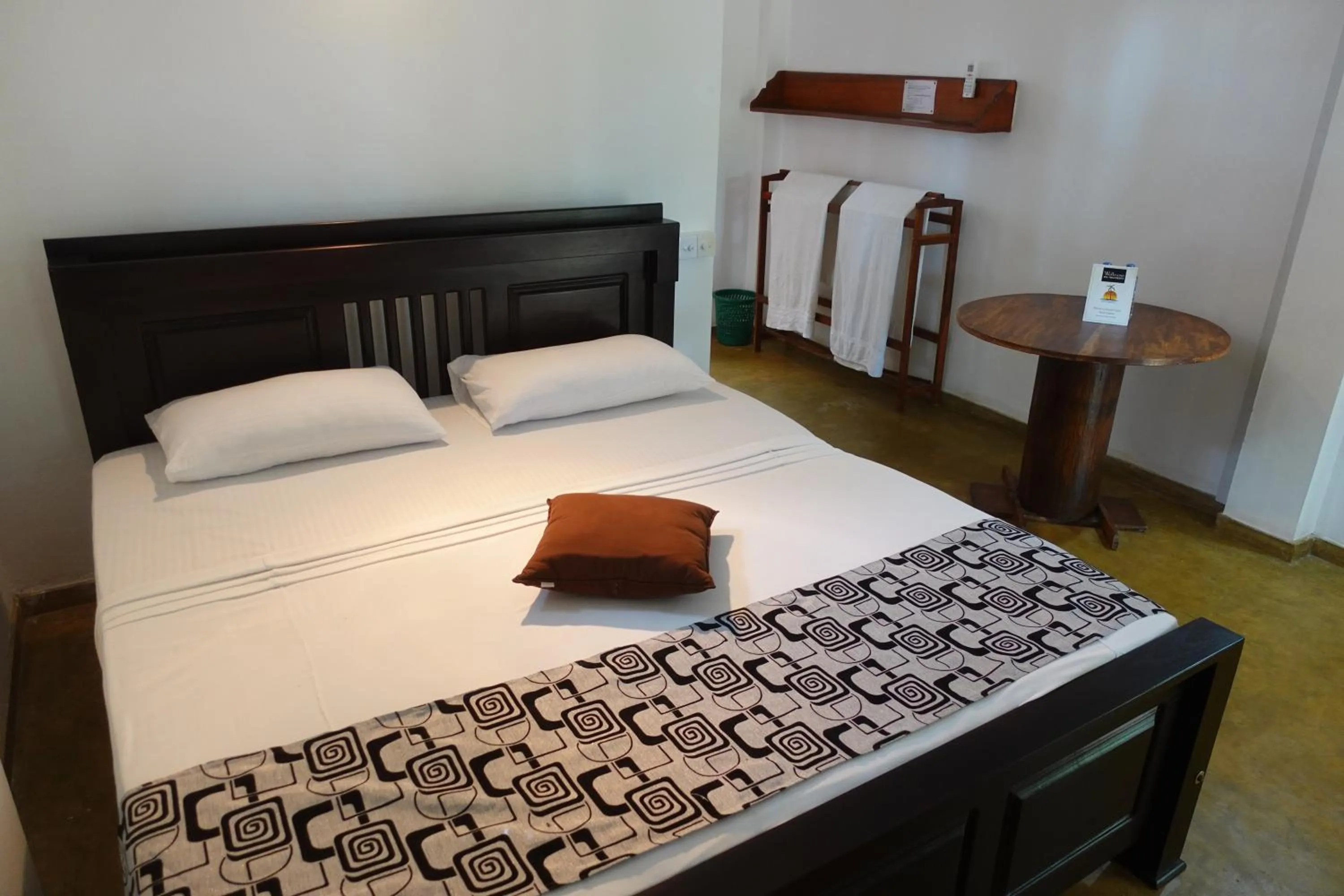 Bed in Ganesh Garden Beach Cabanas