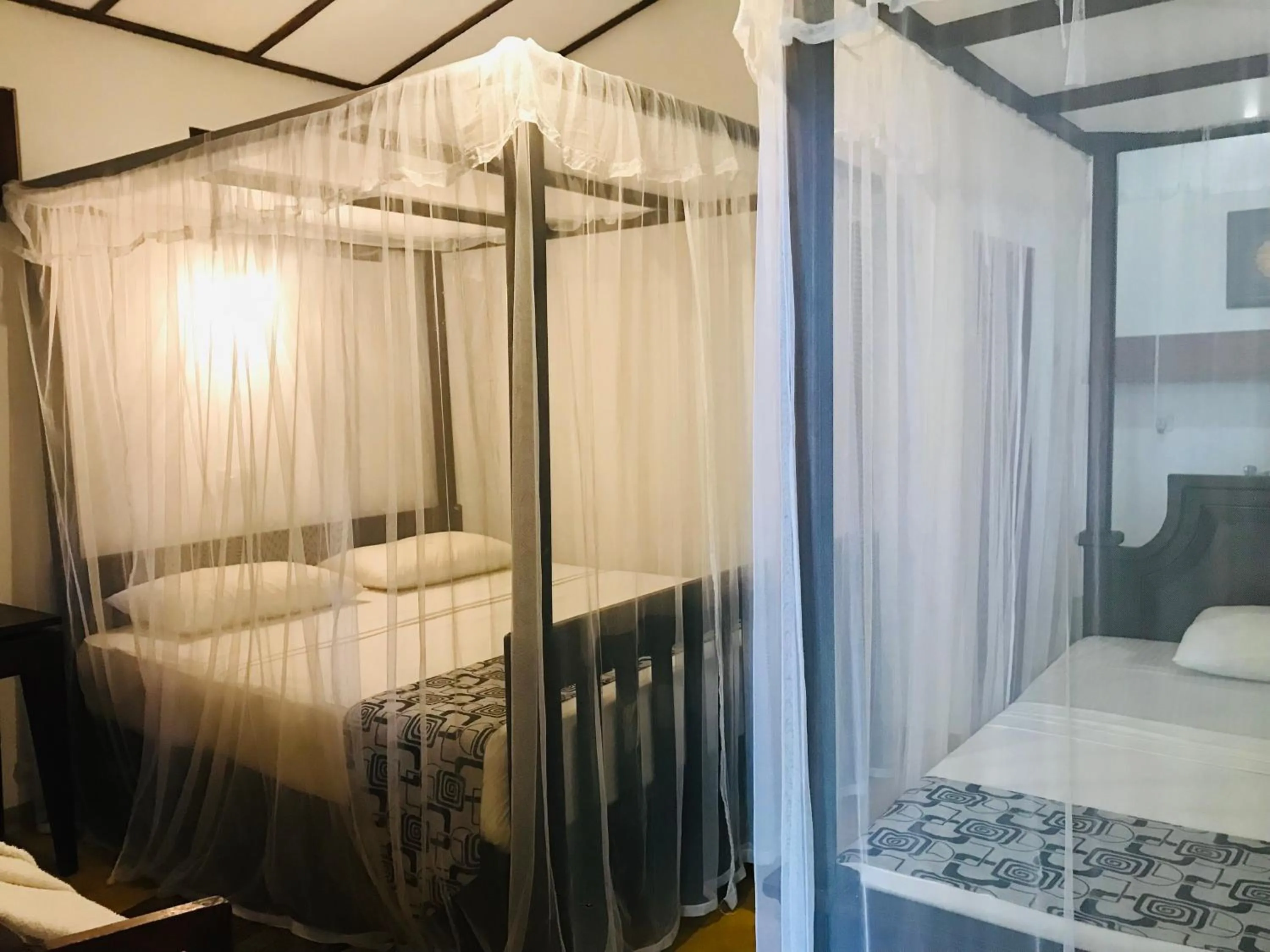 Bed in Ganesh Garden Beach Cabanas