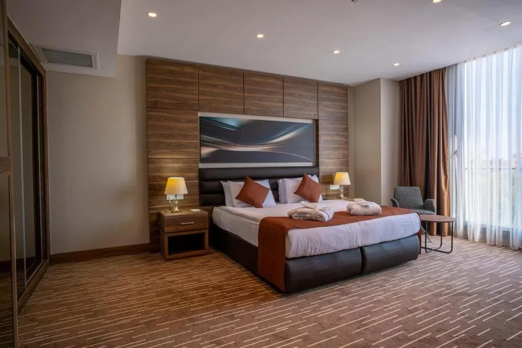 Bed in Ekor Elegance Hotel