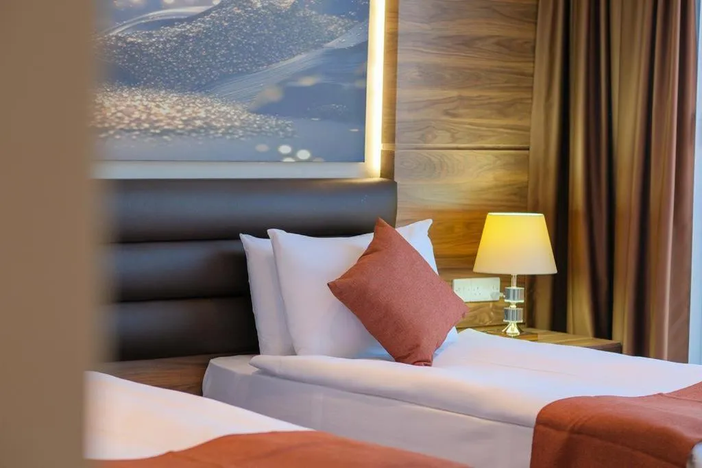 Bed in Ekor Elegance Hotel