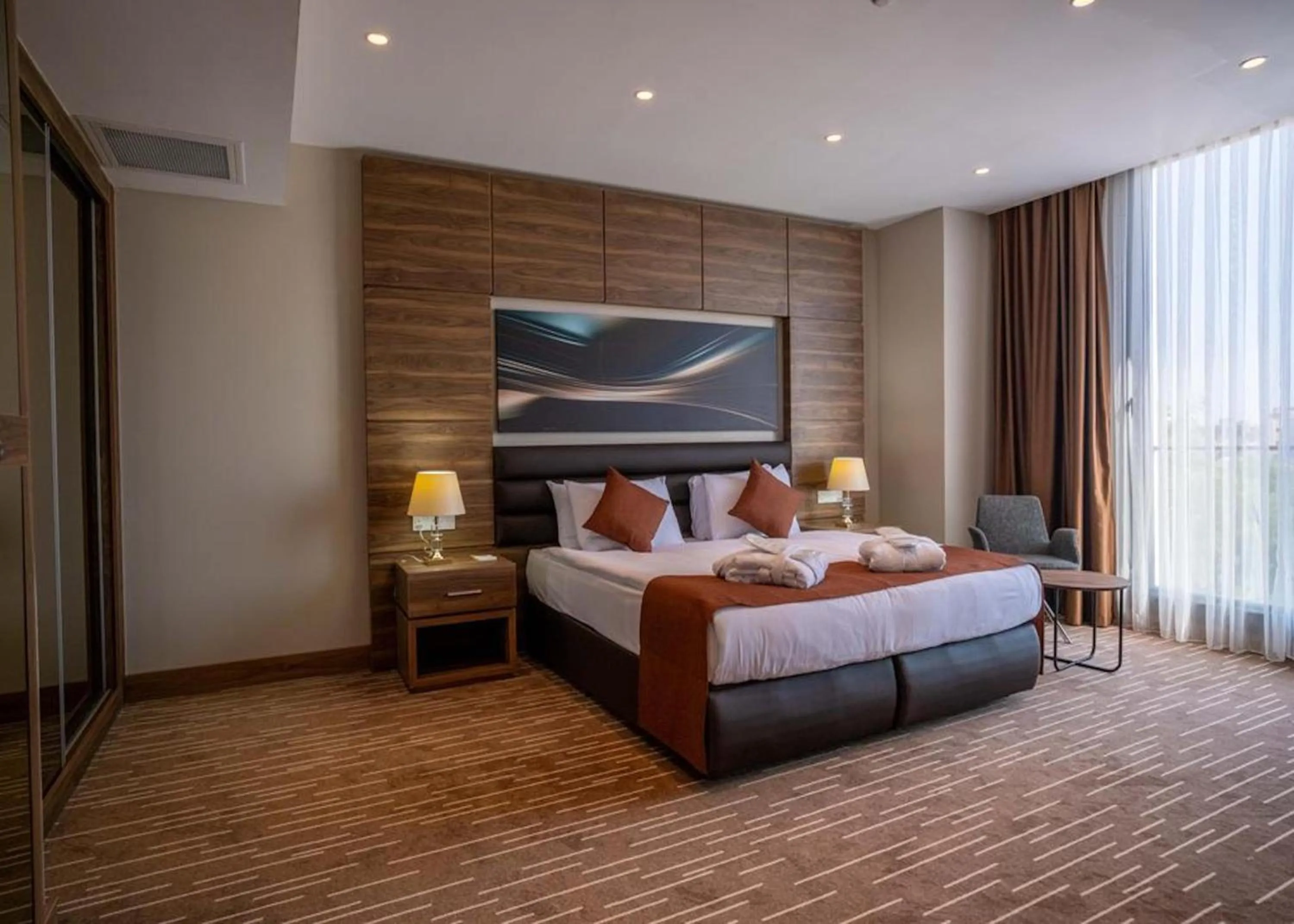 Bed in Ekor Elegance Hotel