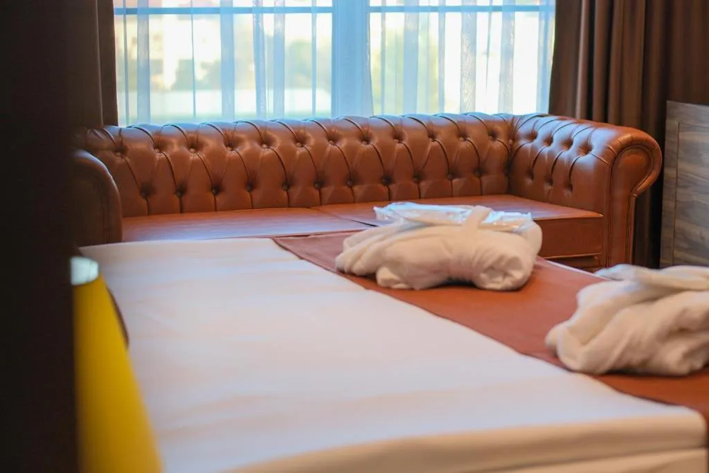 Bed in Ekor Elegance Hotel