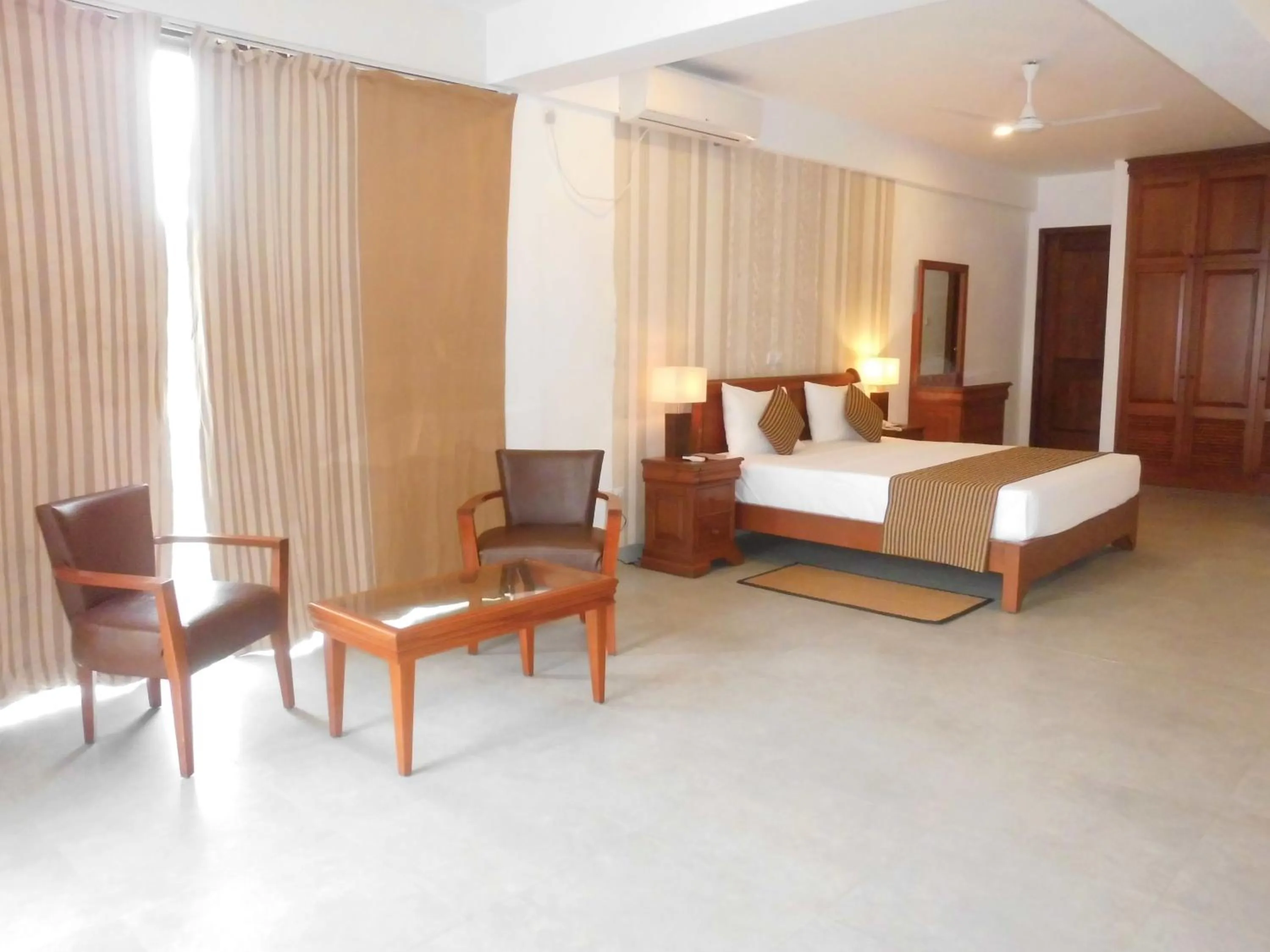 Photo of the whole room, Bed in Paradise Beach Club