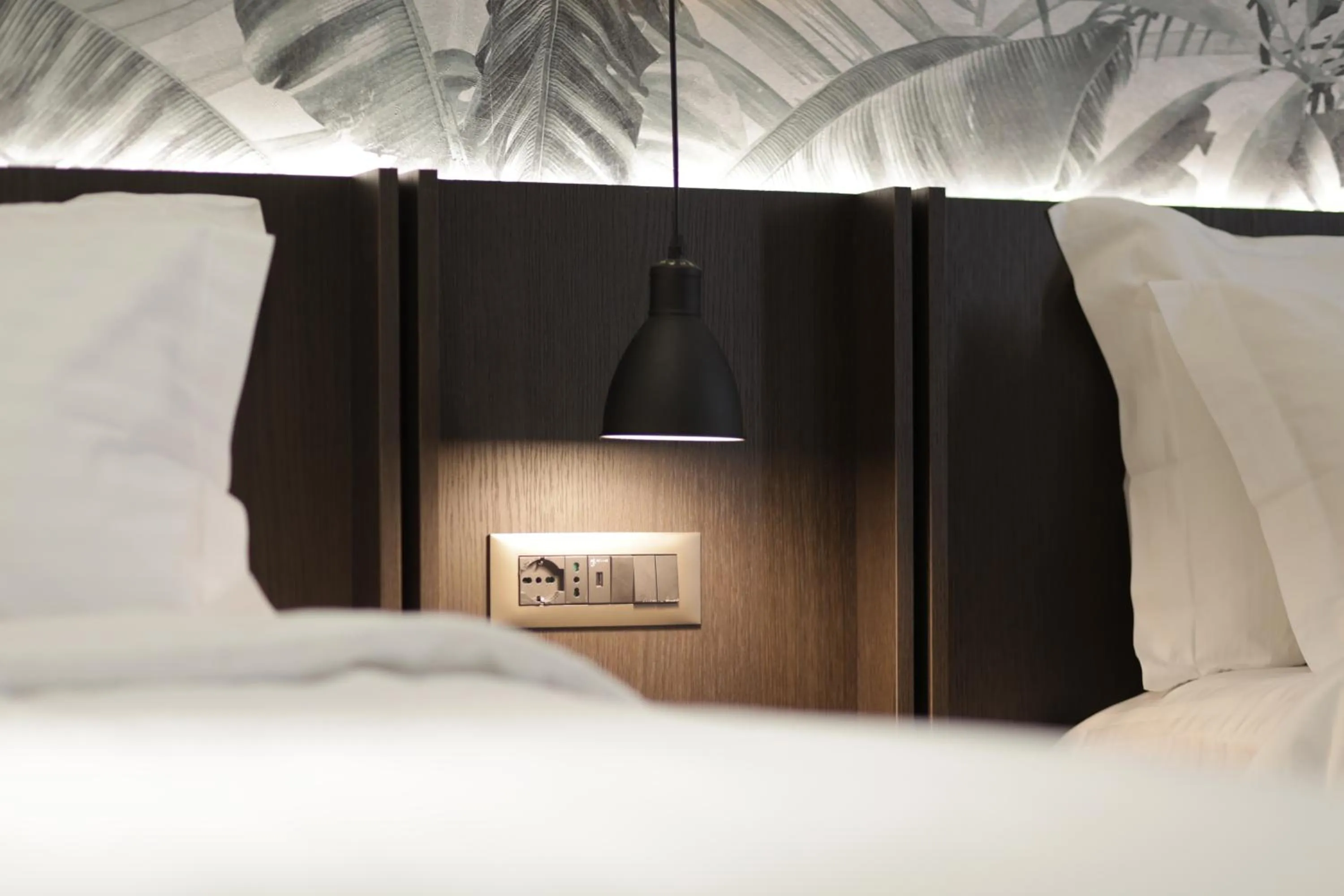 Bed in Gremmy Boutique Hotel