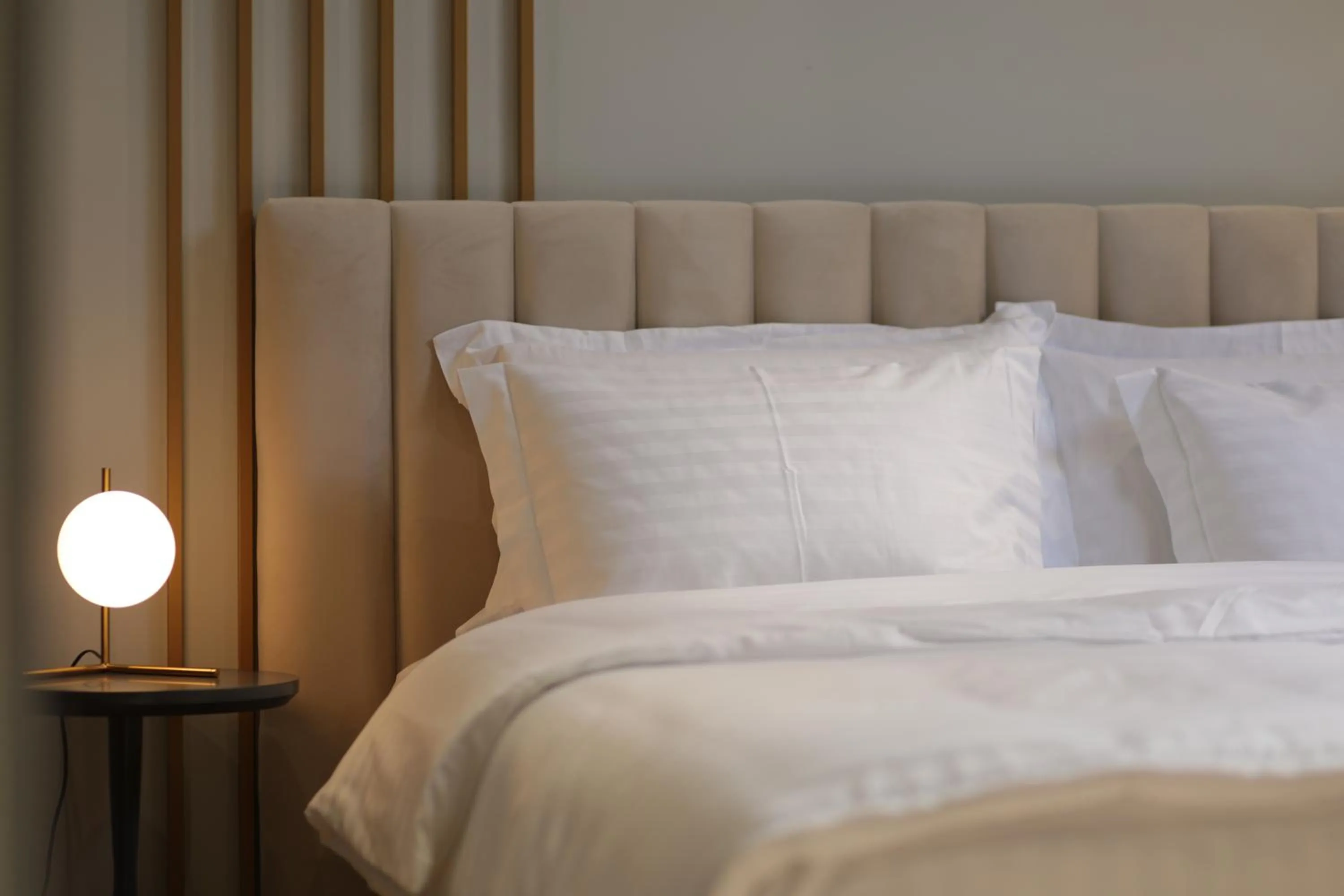 Bed in Gremmy Boutique Hotel