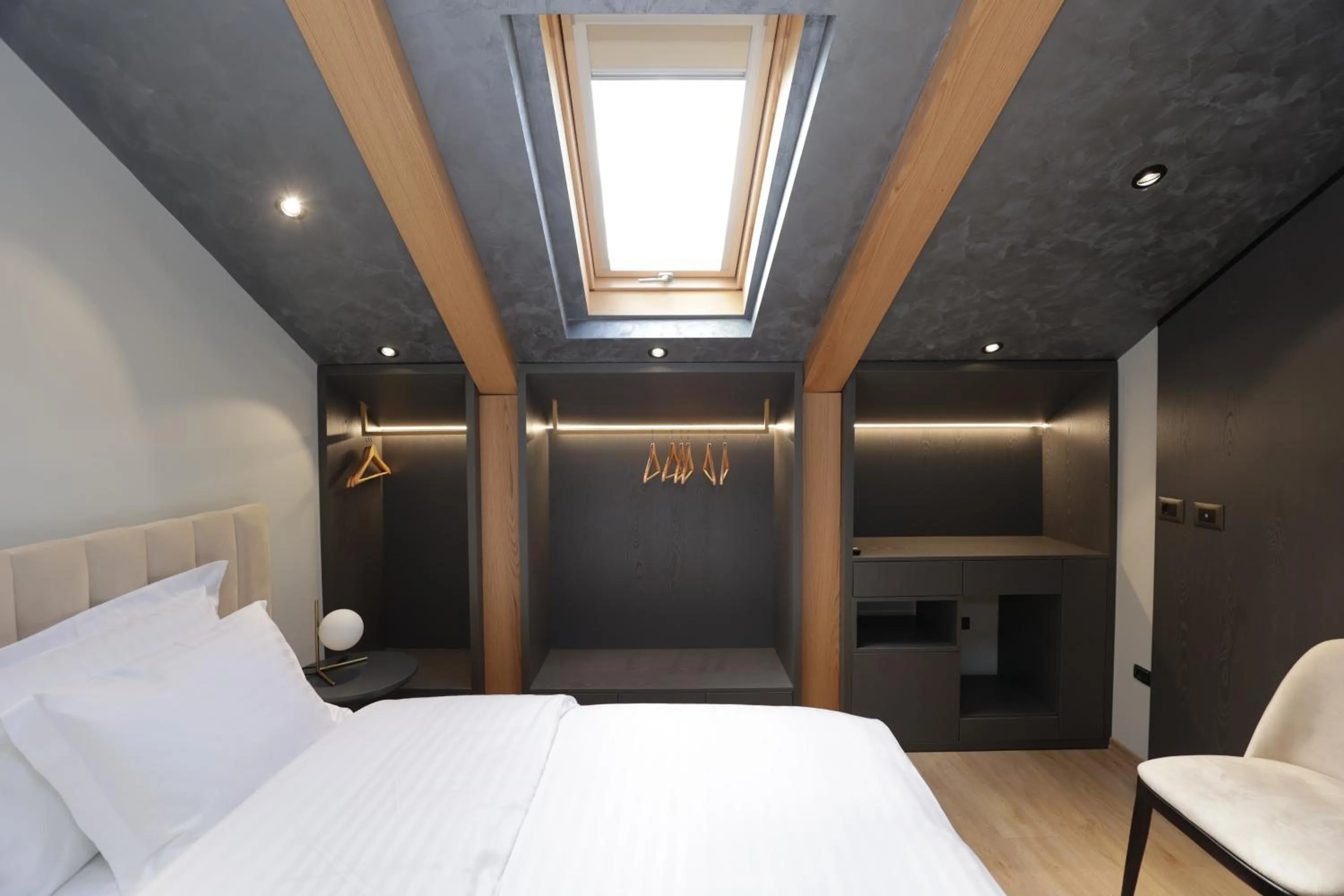 Bed in Gremmy Boutique Hotel