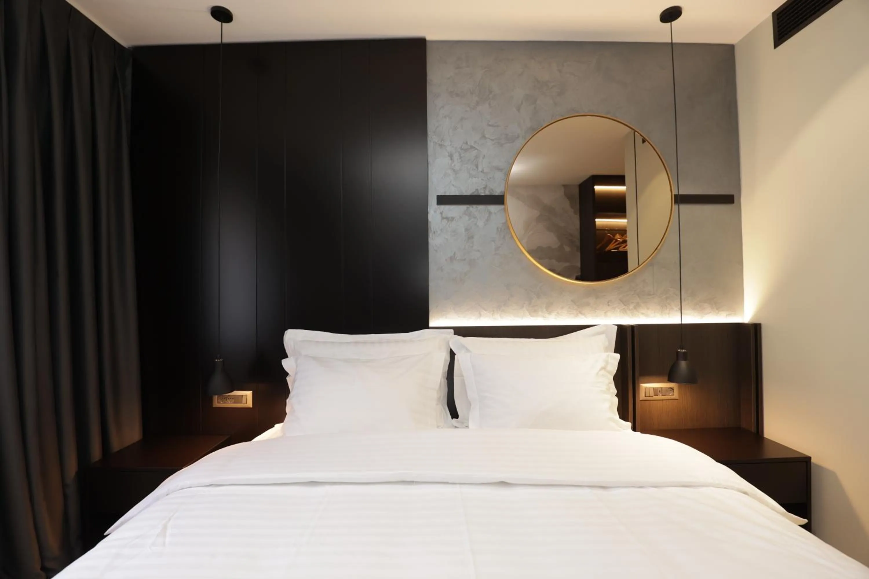 Bed in Gremmy Boutique Hotel