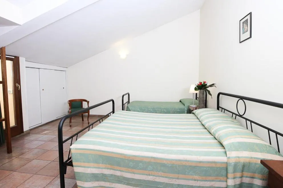 Bed in Casa Di Santa Francesca Romana a Ponte Rotto