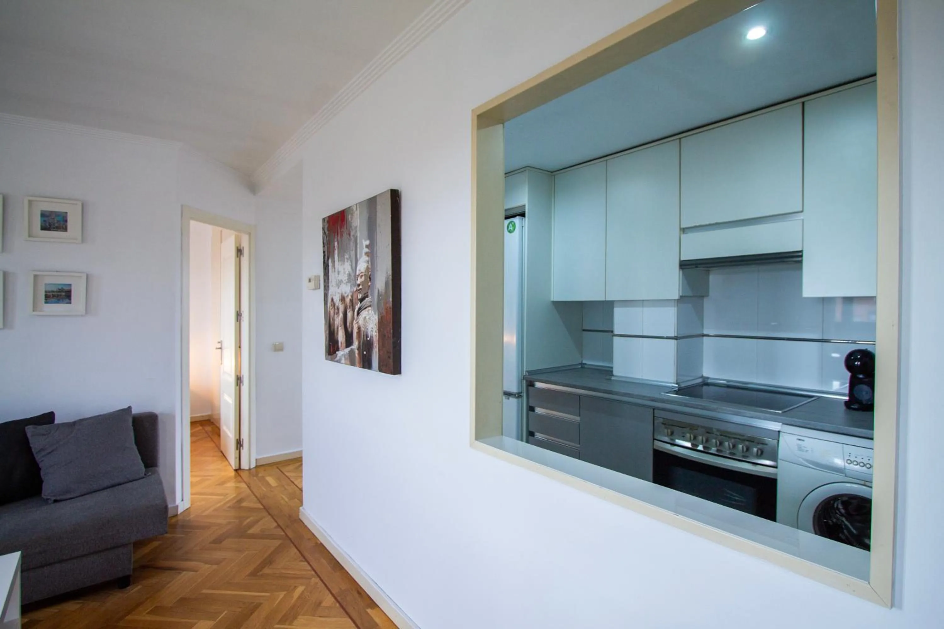 Kitchen or kitchenette in Apartamentos Cinco Rosas