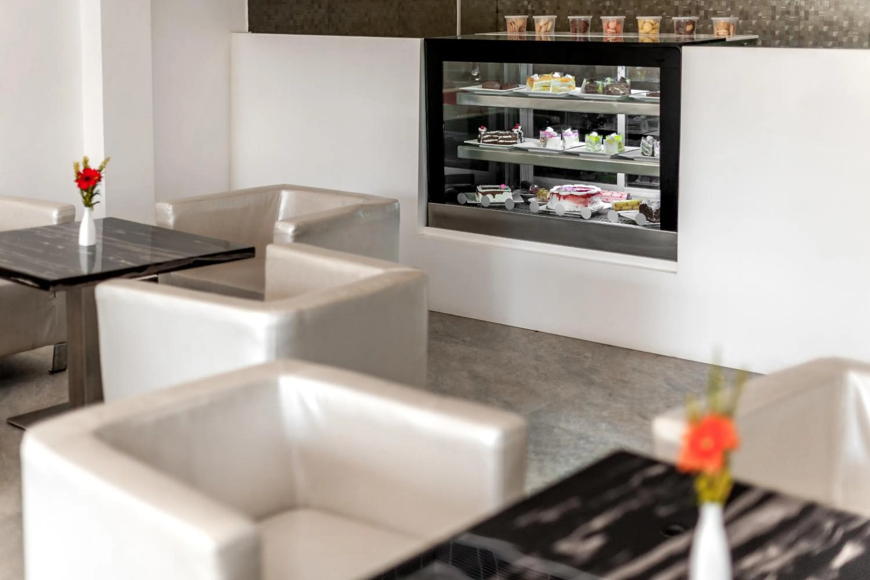 Communal lounge/ TV room in Saaral Residency