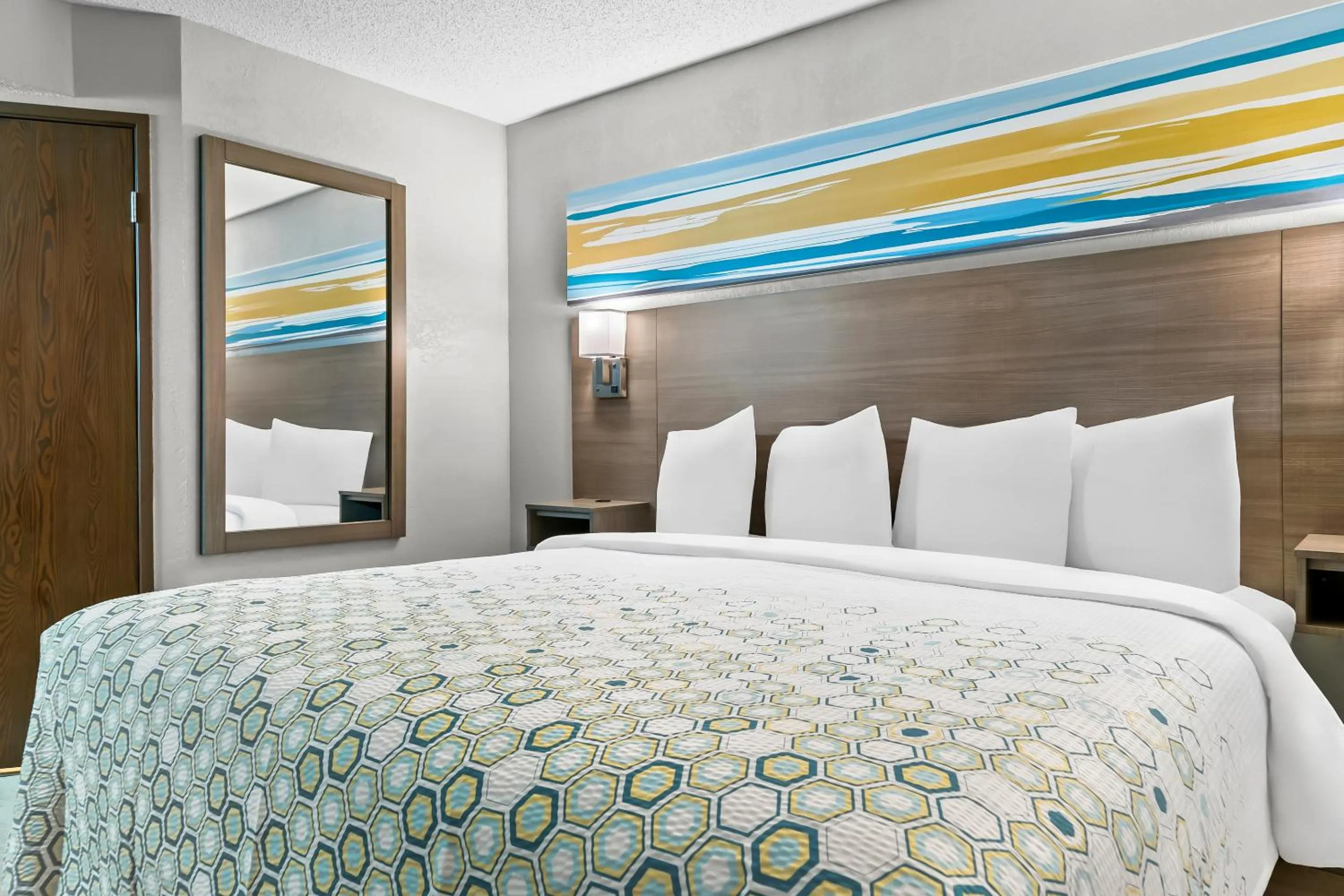 Photo of the whole room, Bed in HomeTowne Studios by Red Roof Flint