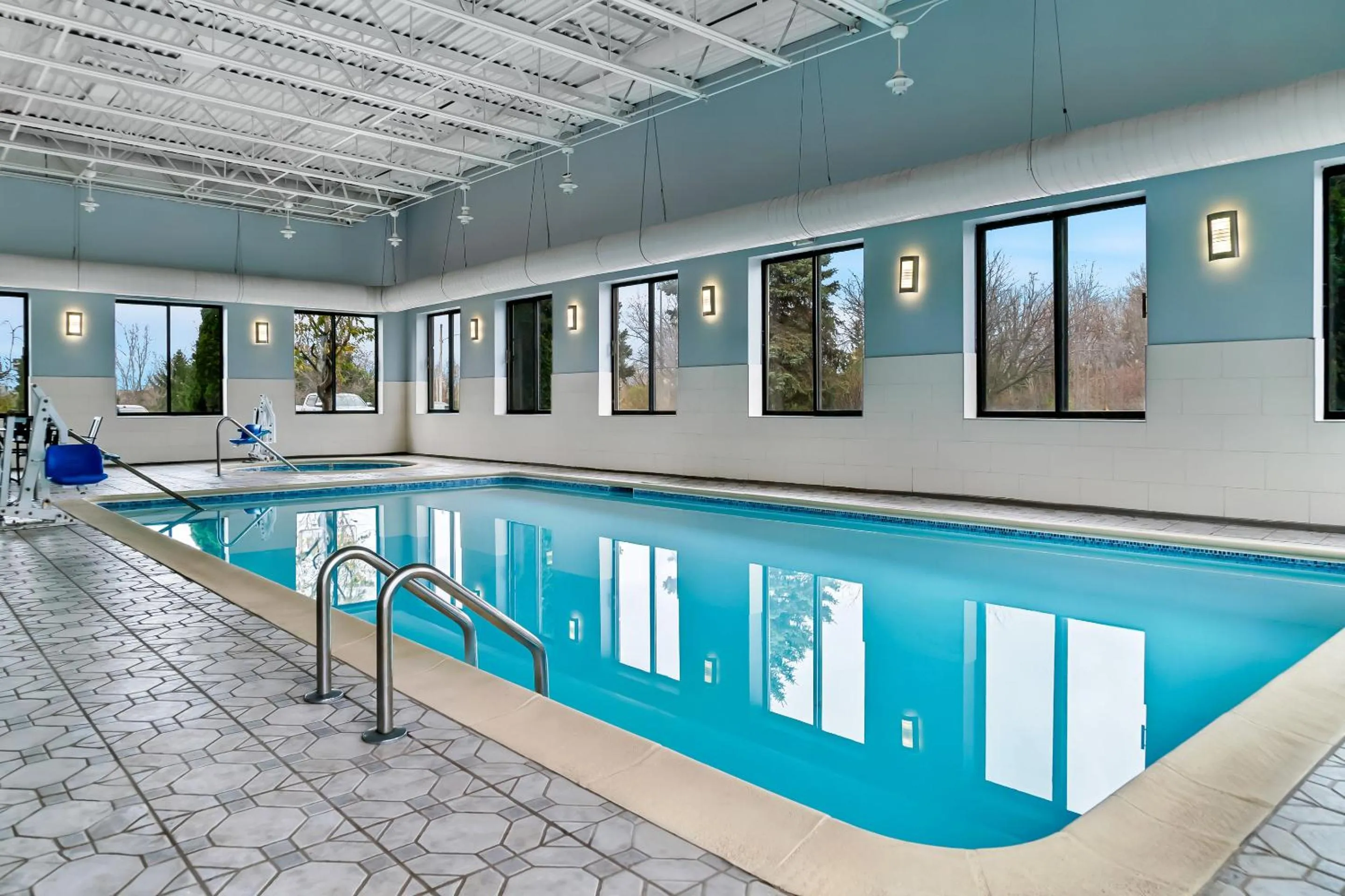 Swimming pool in HomeTowne Studios by Red Roof Flint