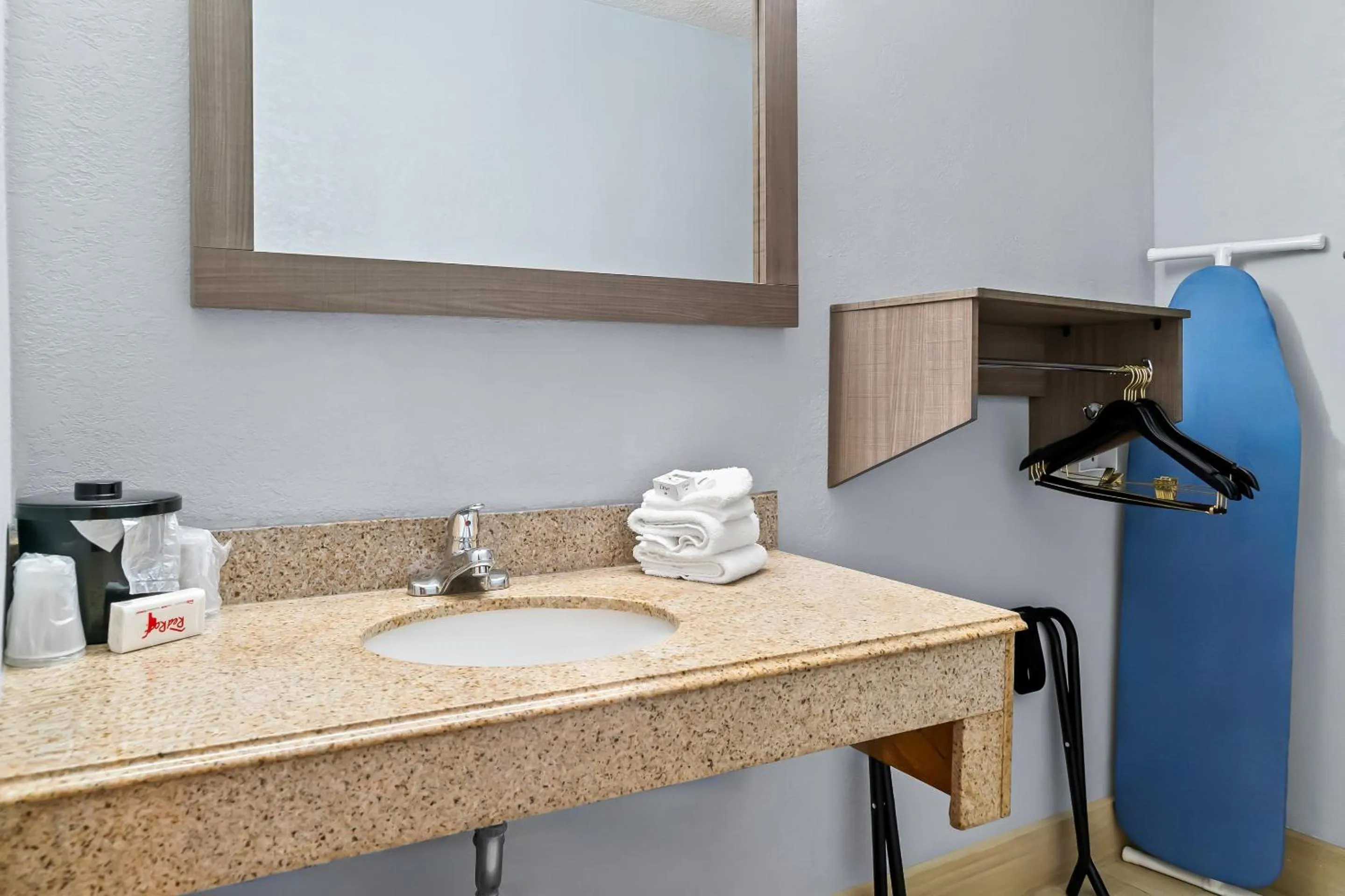 Bathroom in HomeTowne Studios by Red Roof Flint