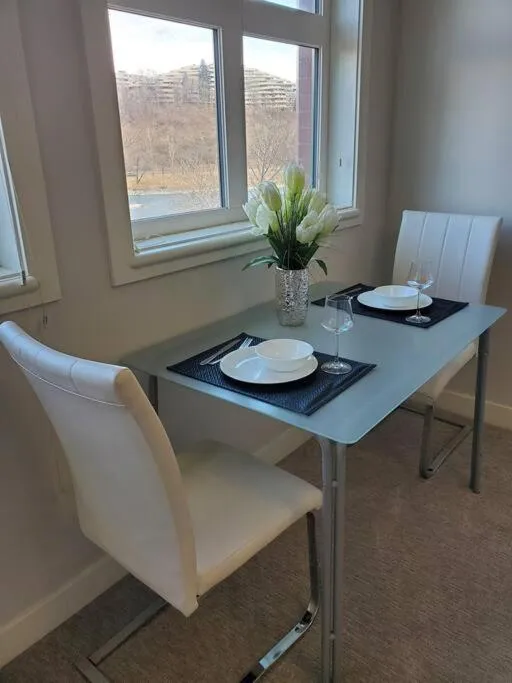 Dining area in Stunning 1 bedroom condo in Calgary with riverview
