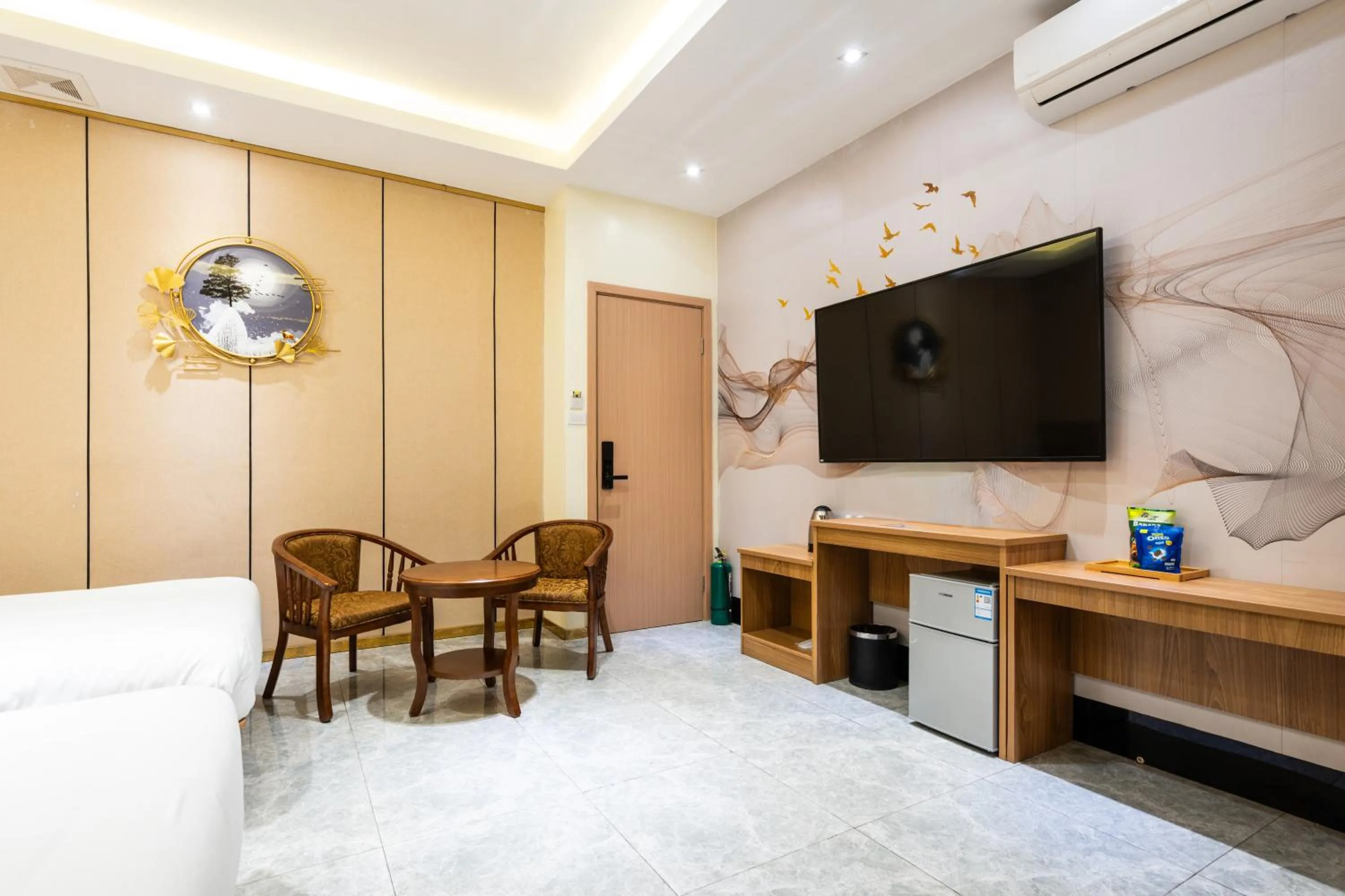 Communal lounge/ TV room, Bed in Home me Hotel Makati