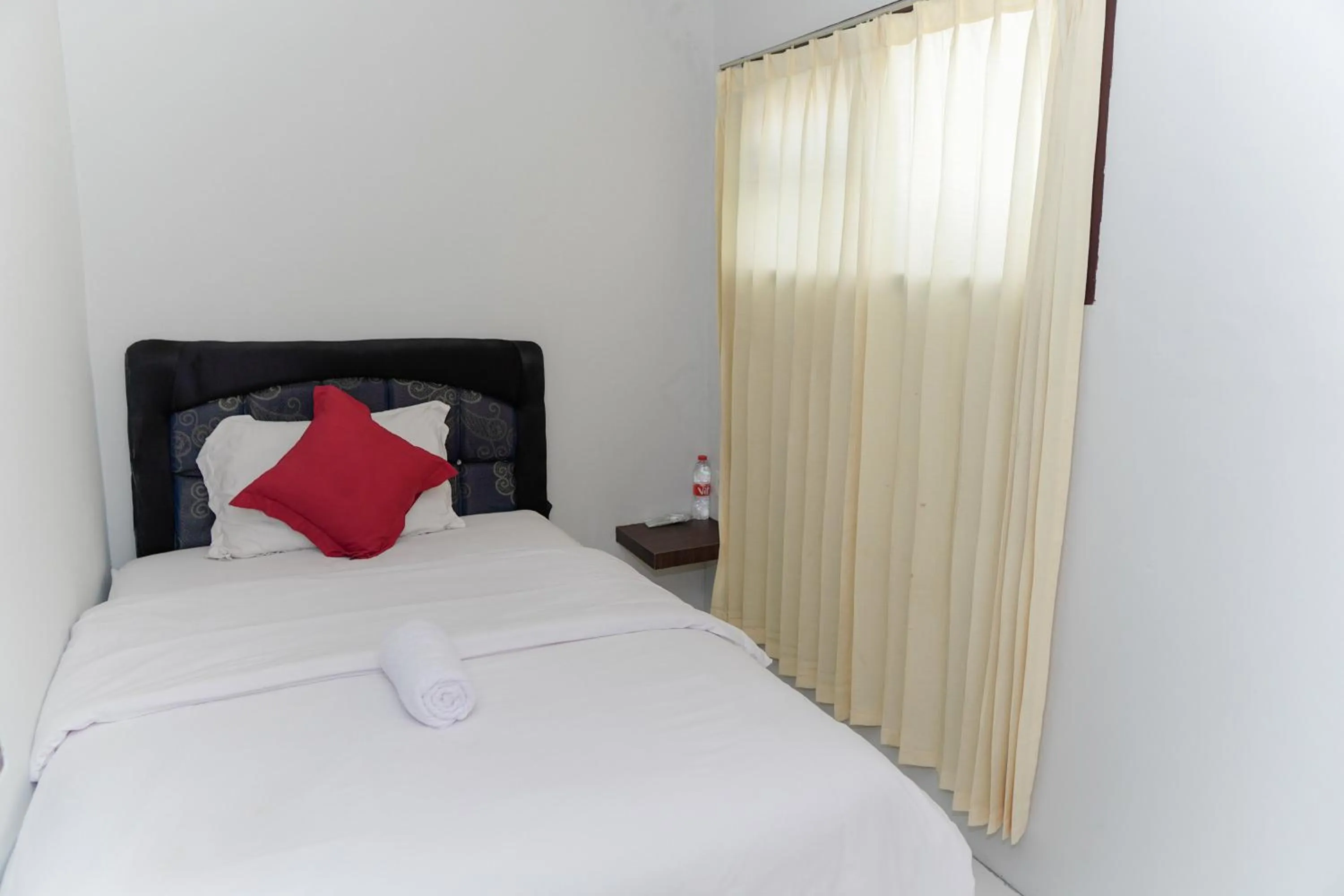 Bed in 555 Nangka Guest House