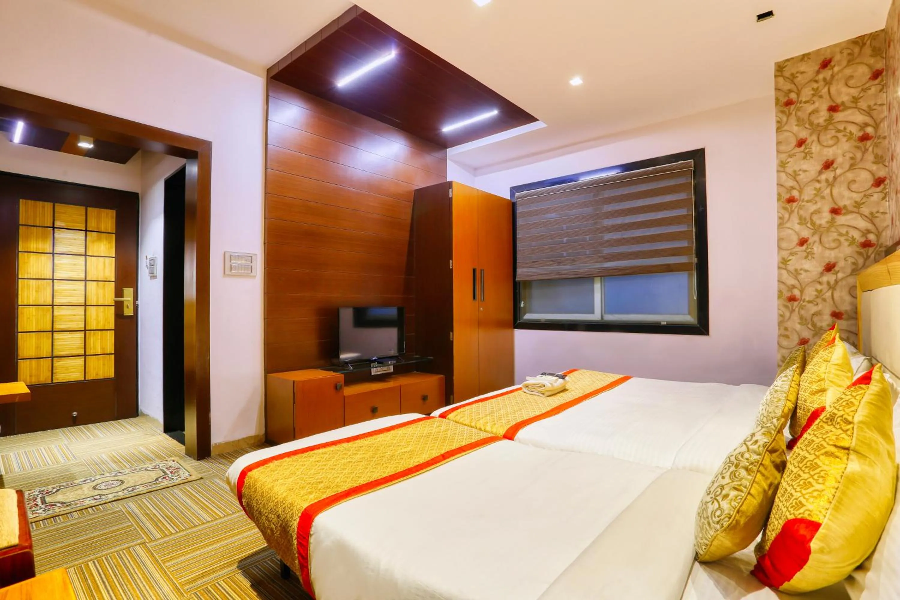 Bedroom, Bed in The Ashoka Hotel