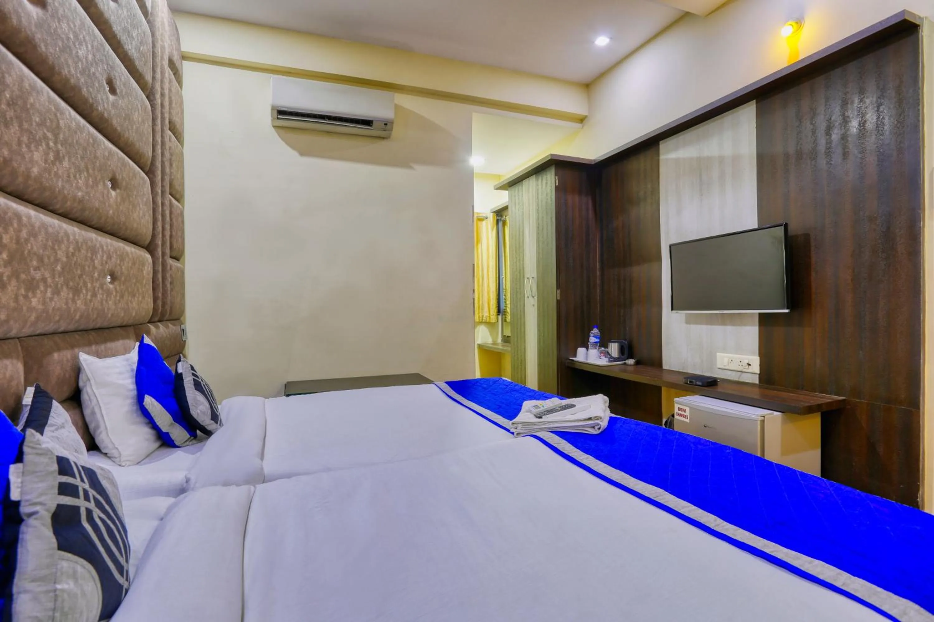 Bedroom in The Ashoka Hotel