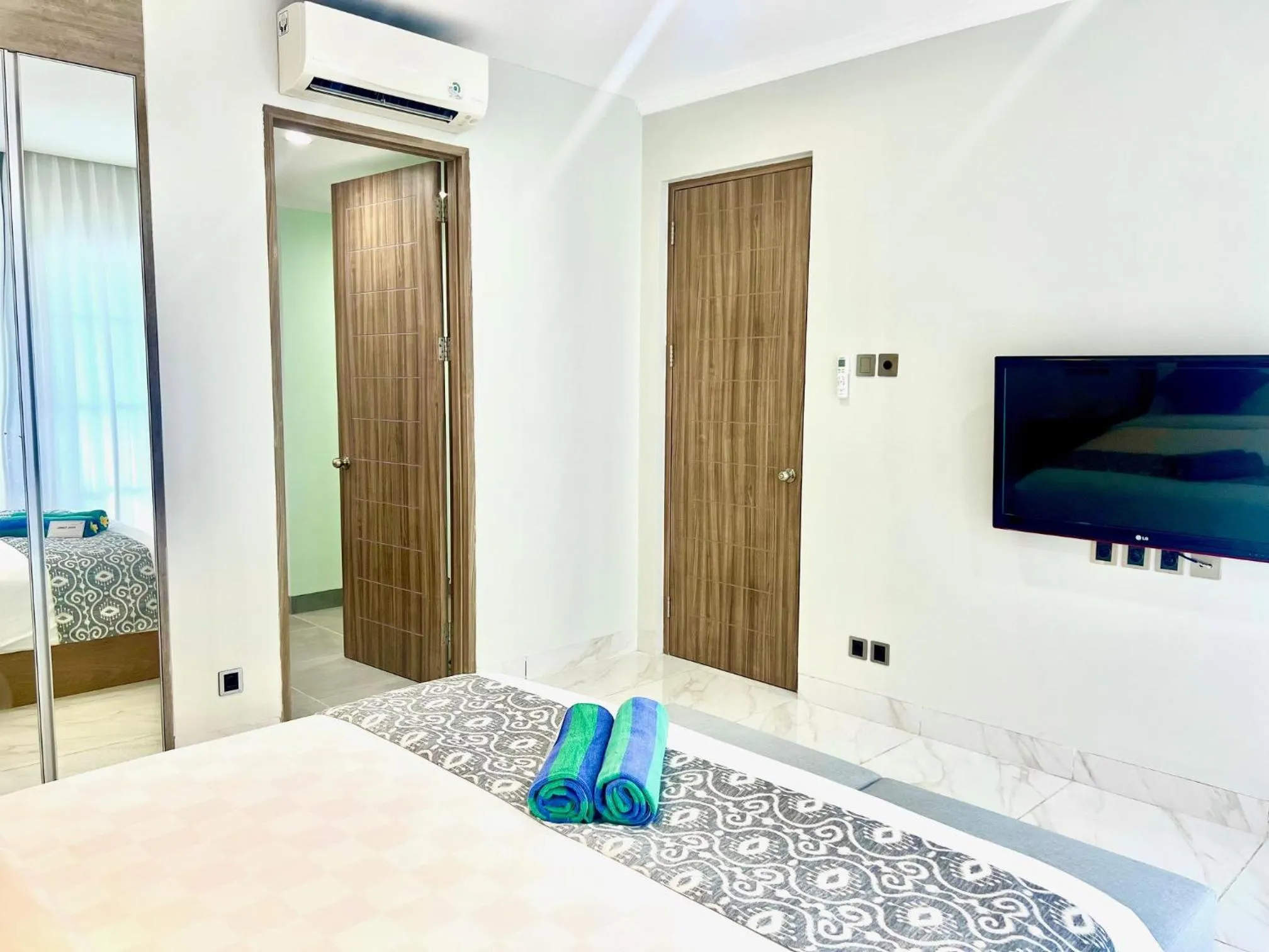 Bed in The Bay Sunflower Apartment