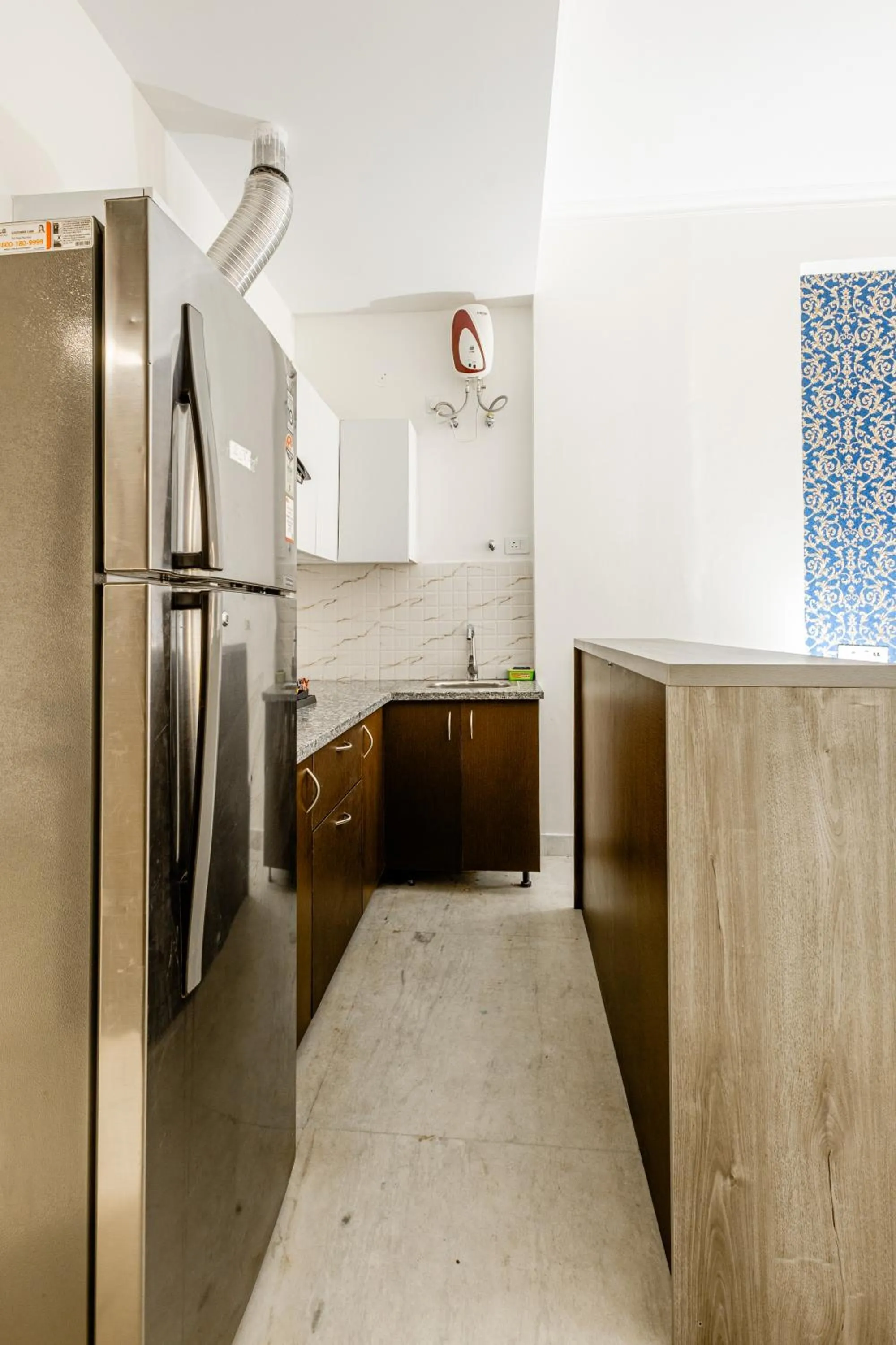 Kitchen or kitchenette in Lime Tree Hotel - Golf Course Road, Sector-43, Gurugram