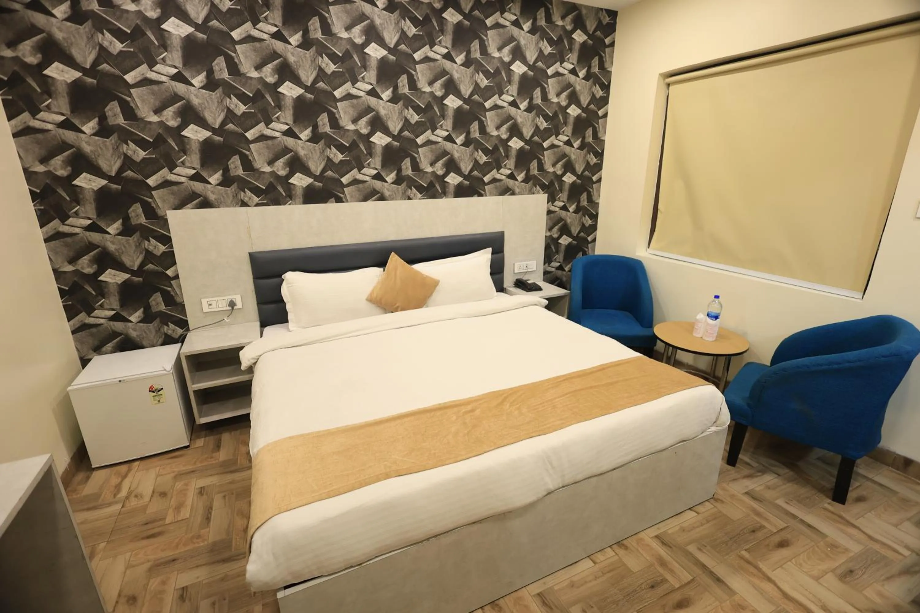 Bed in Hotel Mandakini Royale