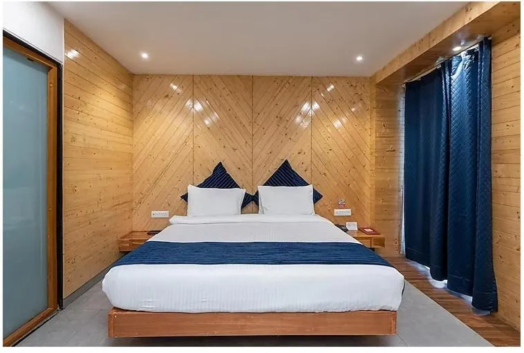 Bed in MV Acosta by Lawrence Hotels